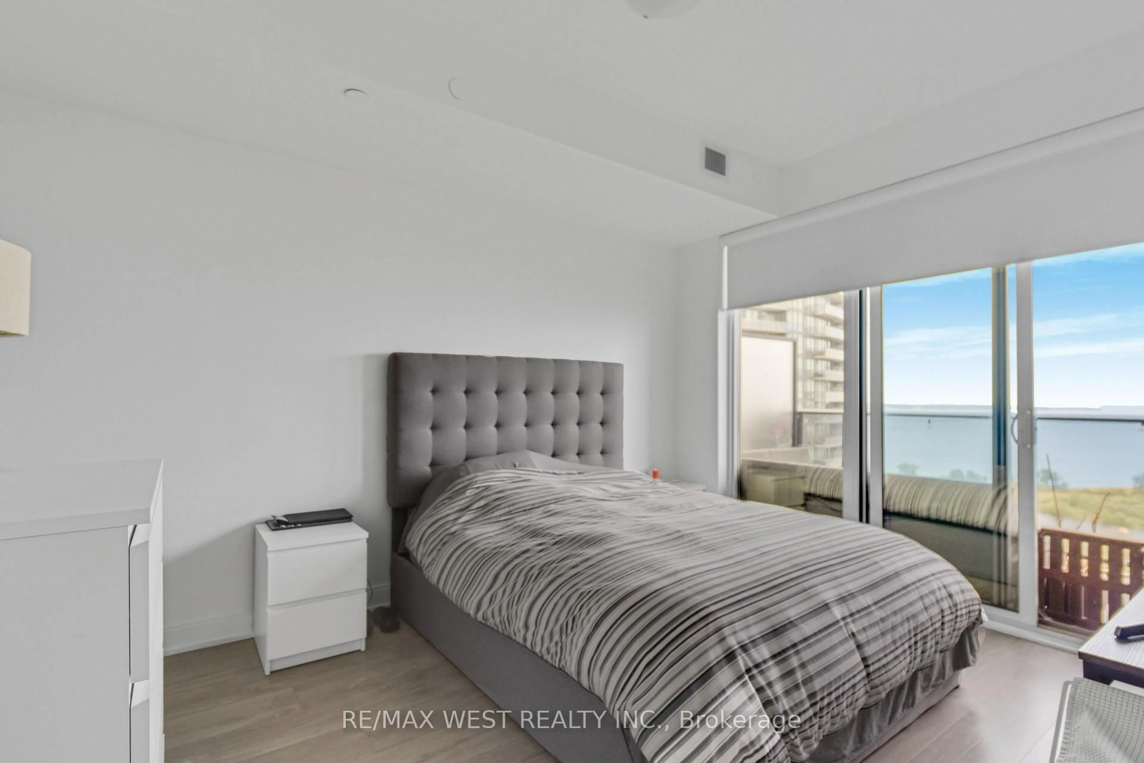 Bedroom with bed, unknown for 70 Annie Craig Dr #2705, Toronto Ontario M8V 0G2