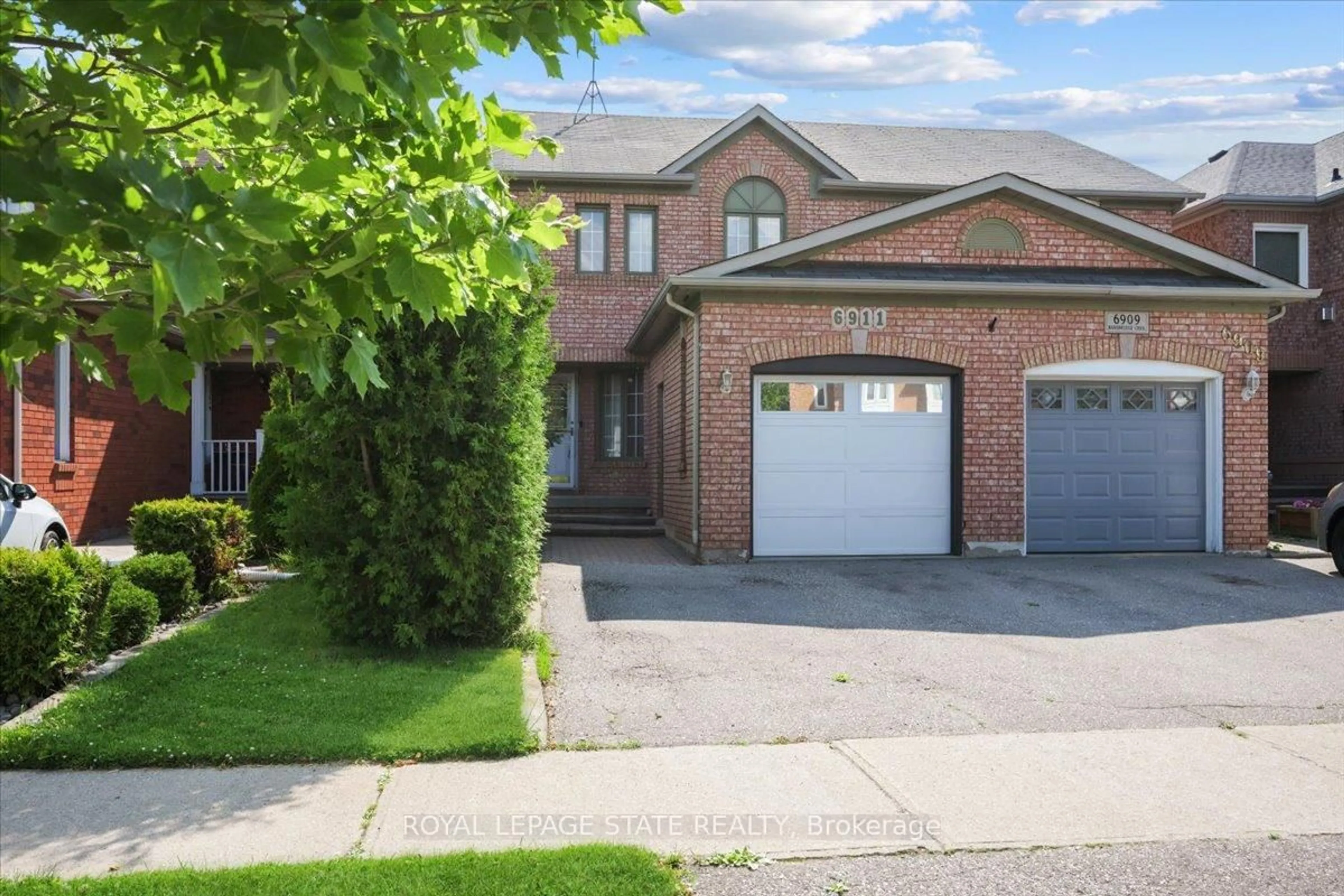 Home with brick exterior material, street for 6911 Bansbridge Cres, Mississauga Ontario L5N 6T1