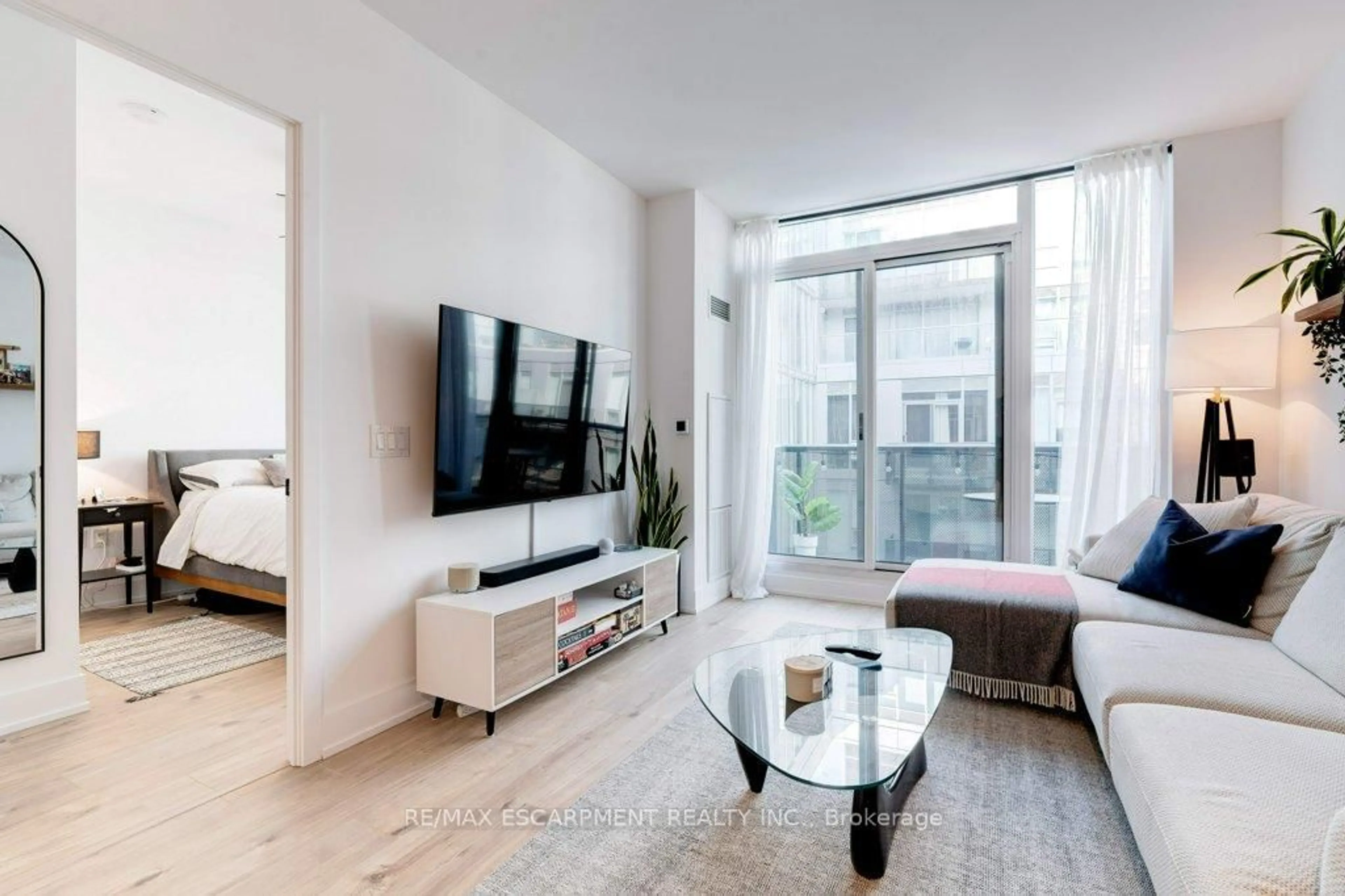 Living room with furniture, unknown for 2450 Old Bronte Rd #601, Oakville Ontario L6M 5P6