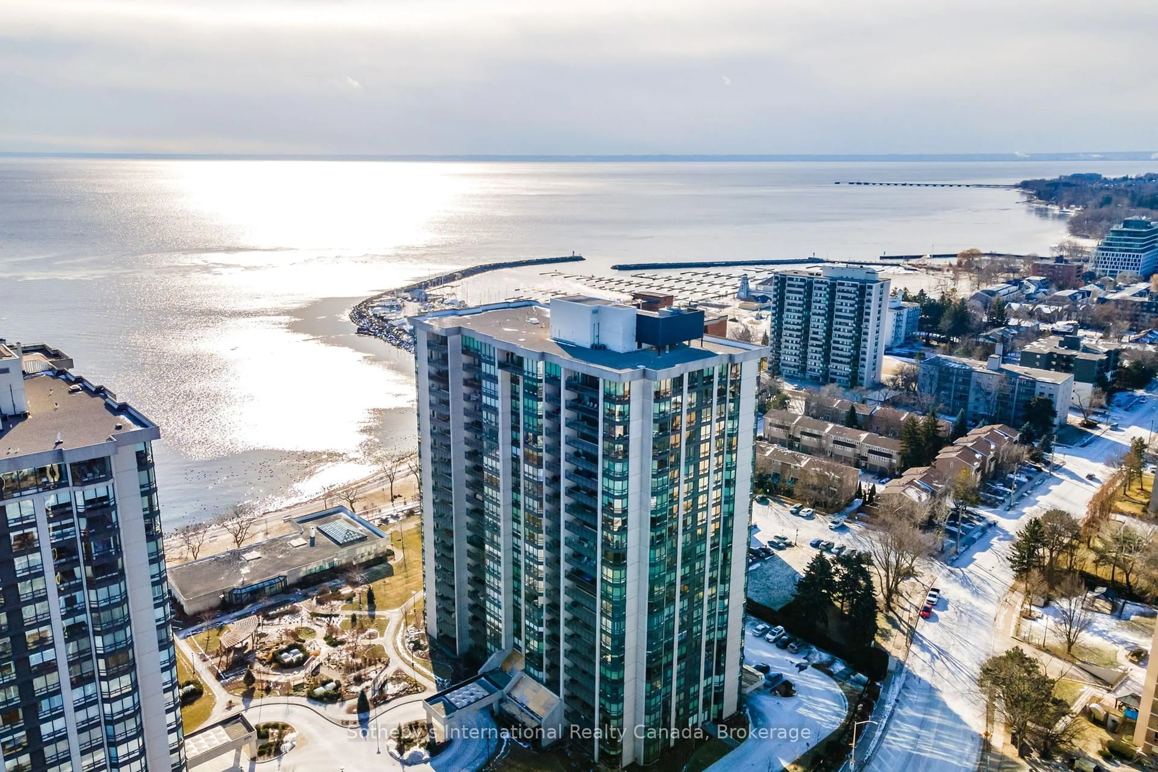 A pic from outside/outdoor area/front of a property/back of a property/a pic from drone, water/lake/river/ocean view for 2180 Marine Dr #1107, Oakville Ontario L6L 5V2