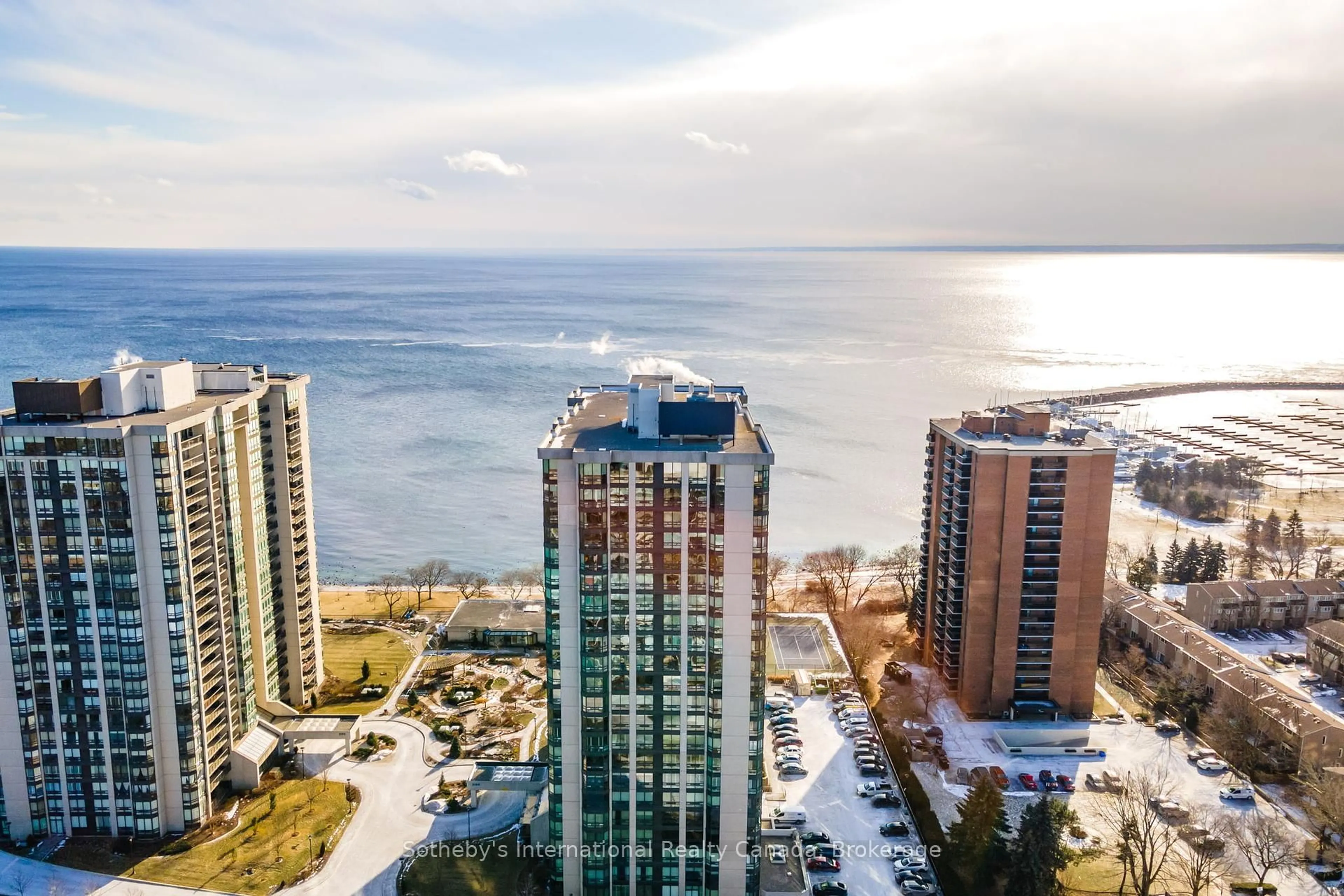A pic from outside/outdoor area/front of a property/back of a property/a pic from drone, water/lake/river/ocean view for 2180 Marine Dr #1107, Oakville Ontario L6L 5V2