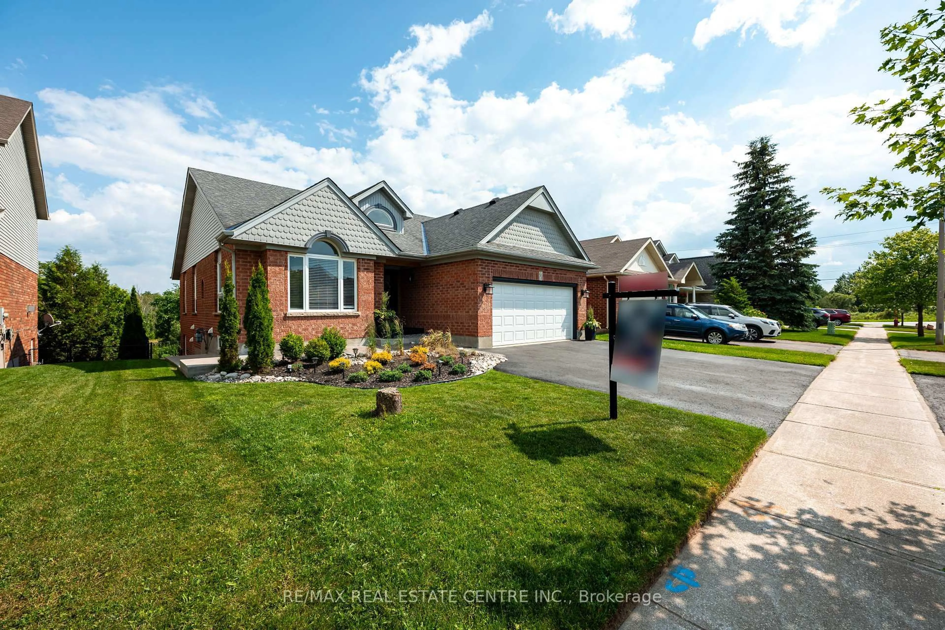 Home with brick exterior material, street for 103 Hunter Rd, Orangeville Ontario L9W 5C2