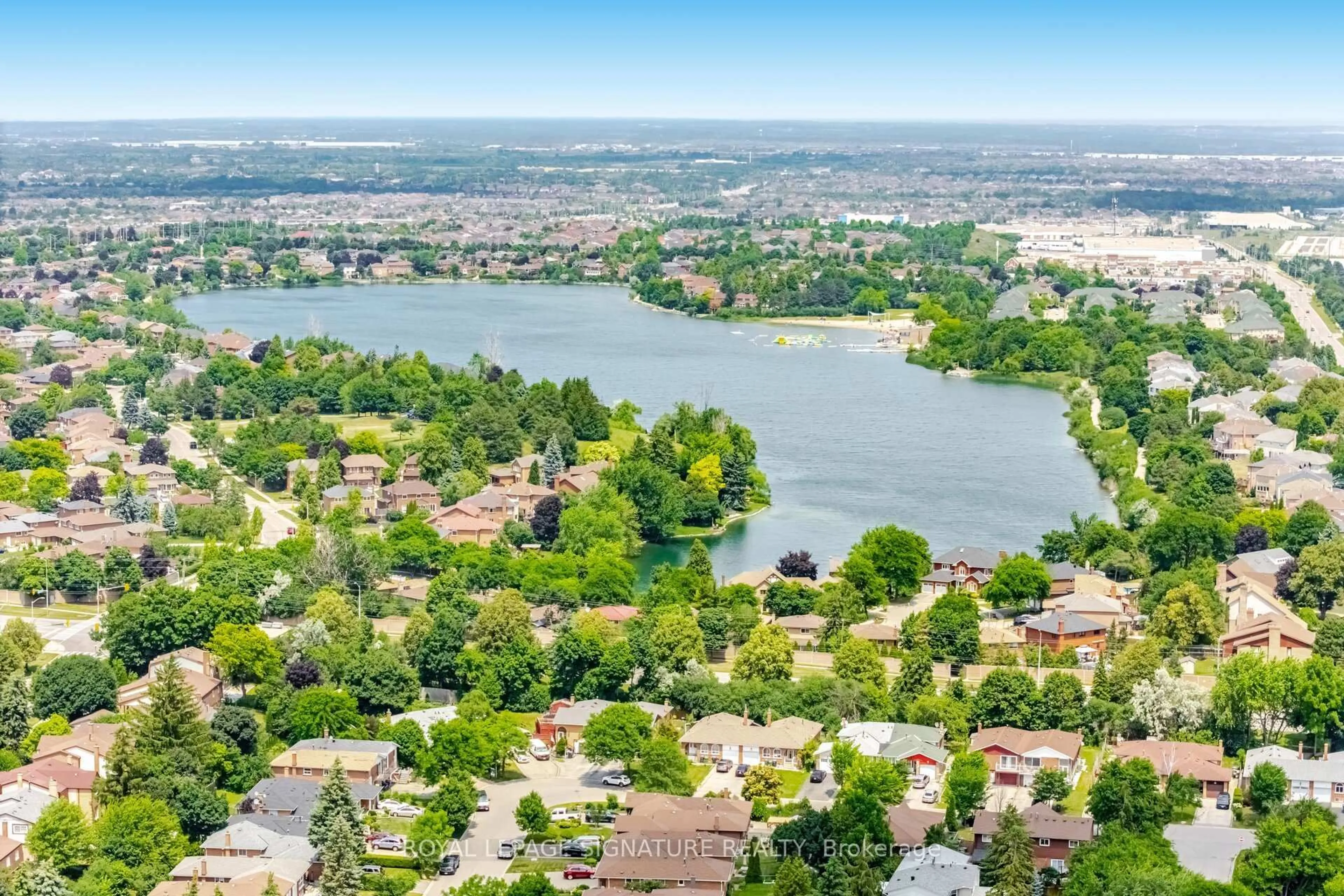 A pic from outside/outdoor area/front of a property/back of a property/a pic from drone, water/lake/river/ocean view for 71 Mandarin Cres, Brampton Ontario L6S 2S2