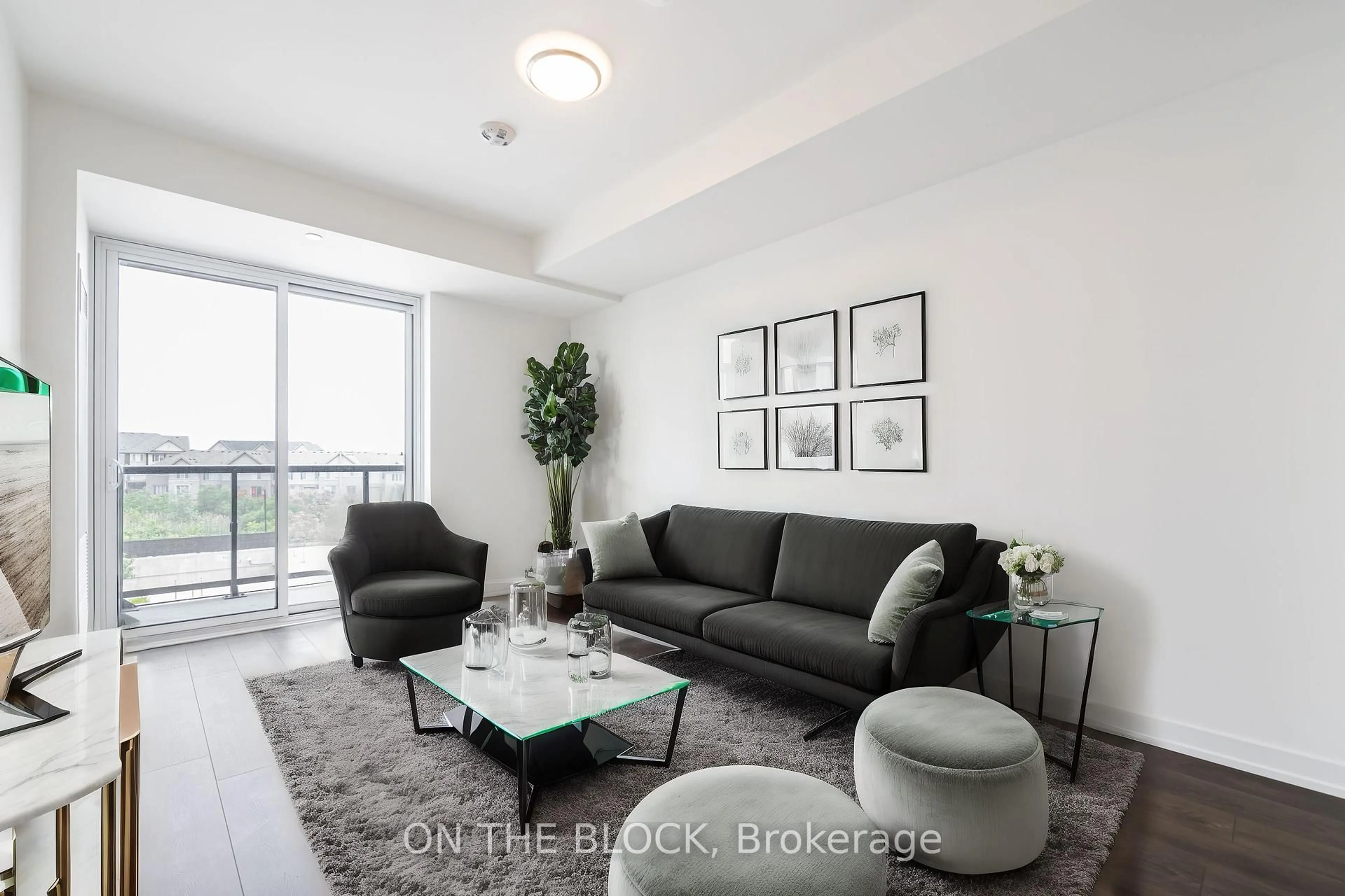 Living room with furniture, unknown for 335 Wheat Boom Dr #317, Oakville Ontario L6H 7Y1