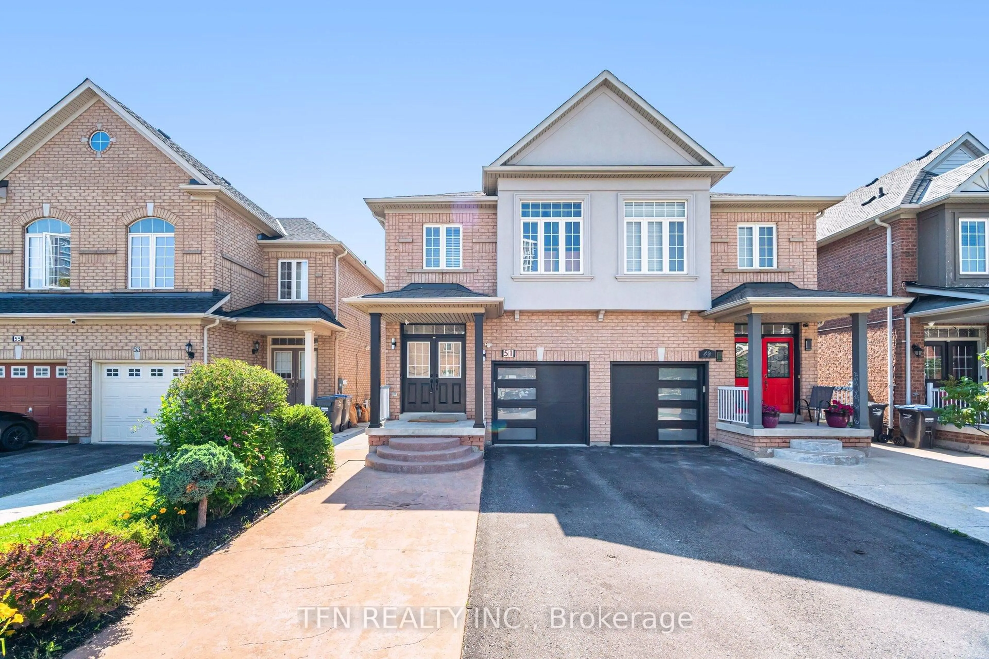 Home with brick exterior material, street for 51 Portrush Tr, Brampton Ontario L6X 0R2