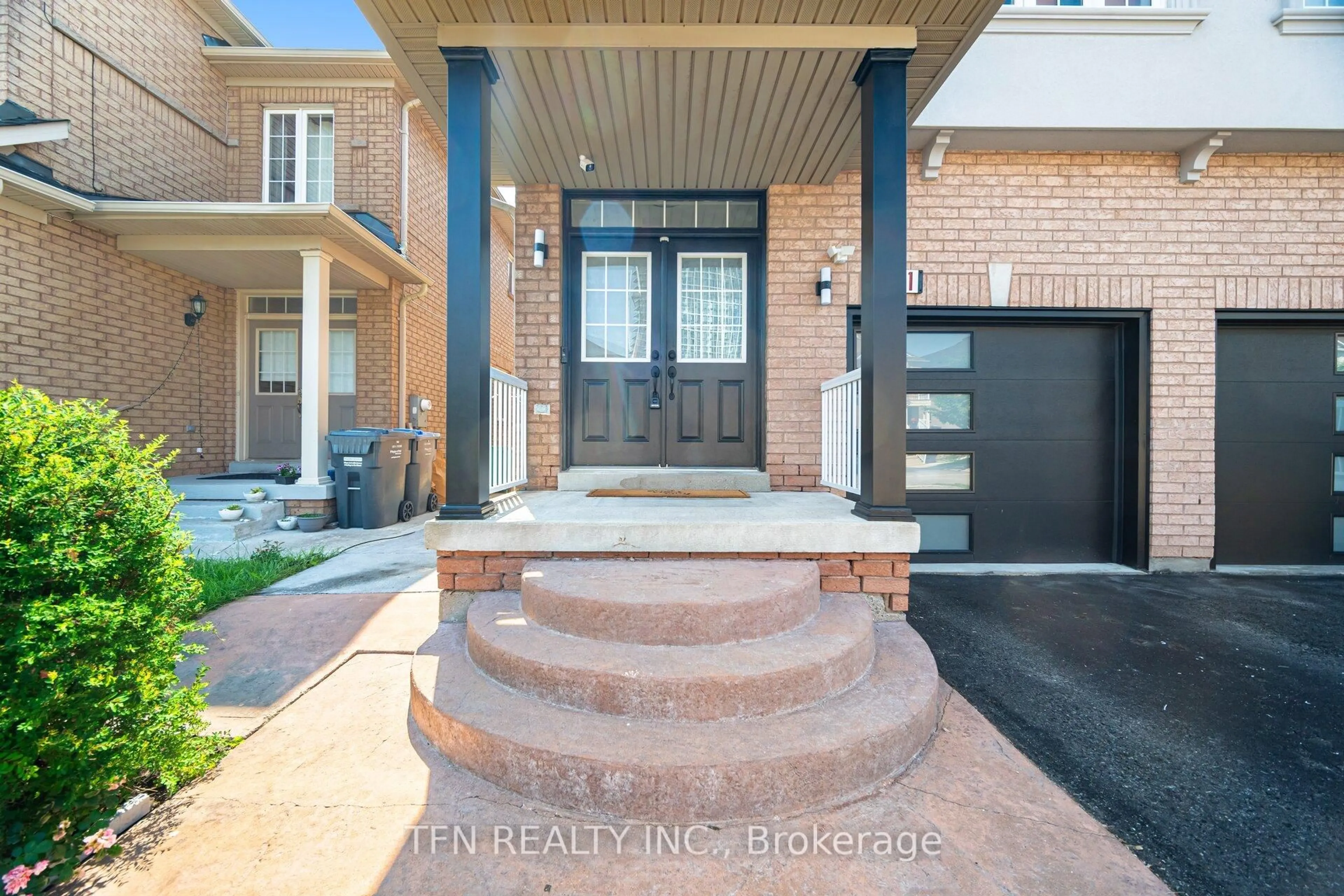 Home with brick exterior material, street for 51 Portrush Tr, Brampton Ontario L6X 0R2