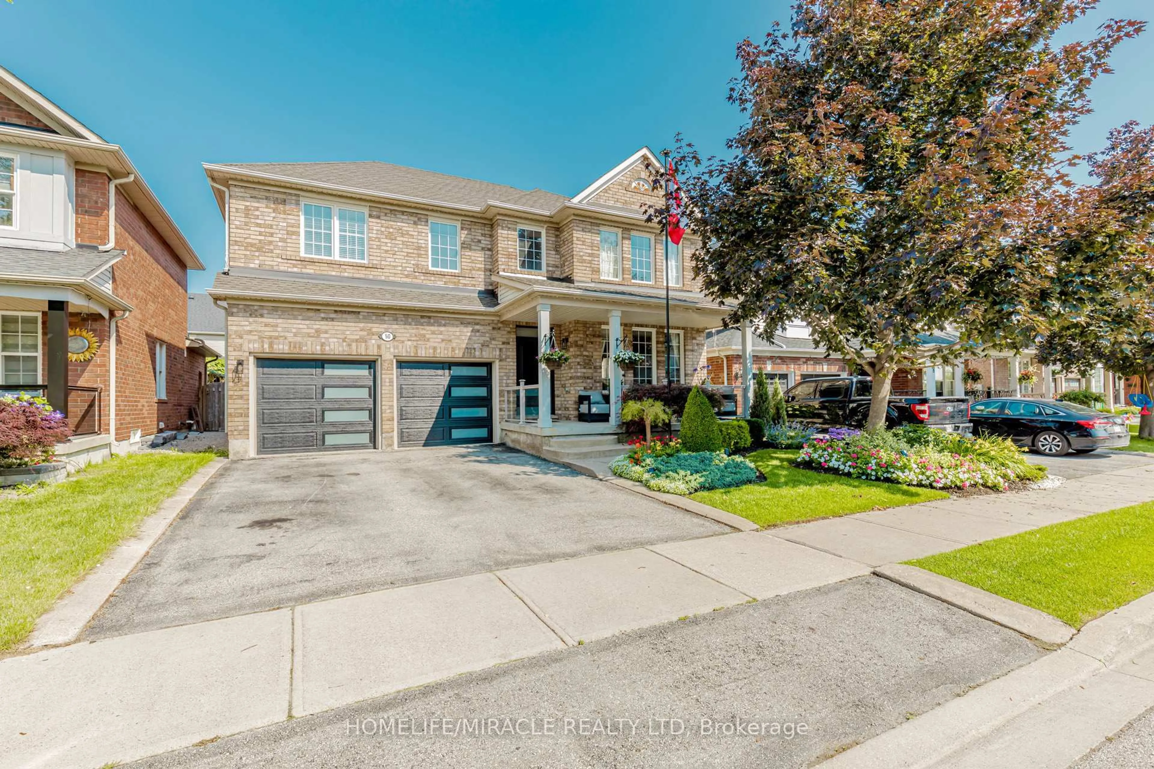 Home with brick exterior material, street for 50 Sandy Beach Rd, Brampton Ontario L7A 2S9