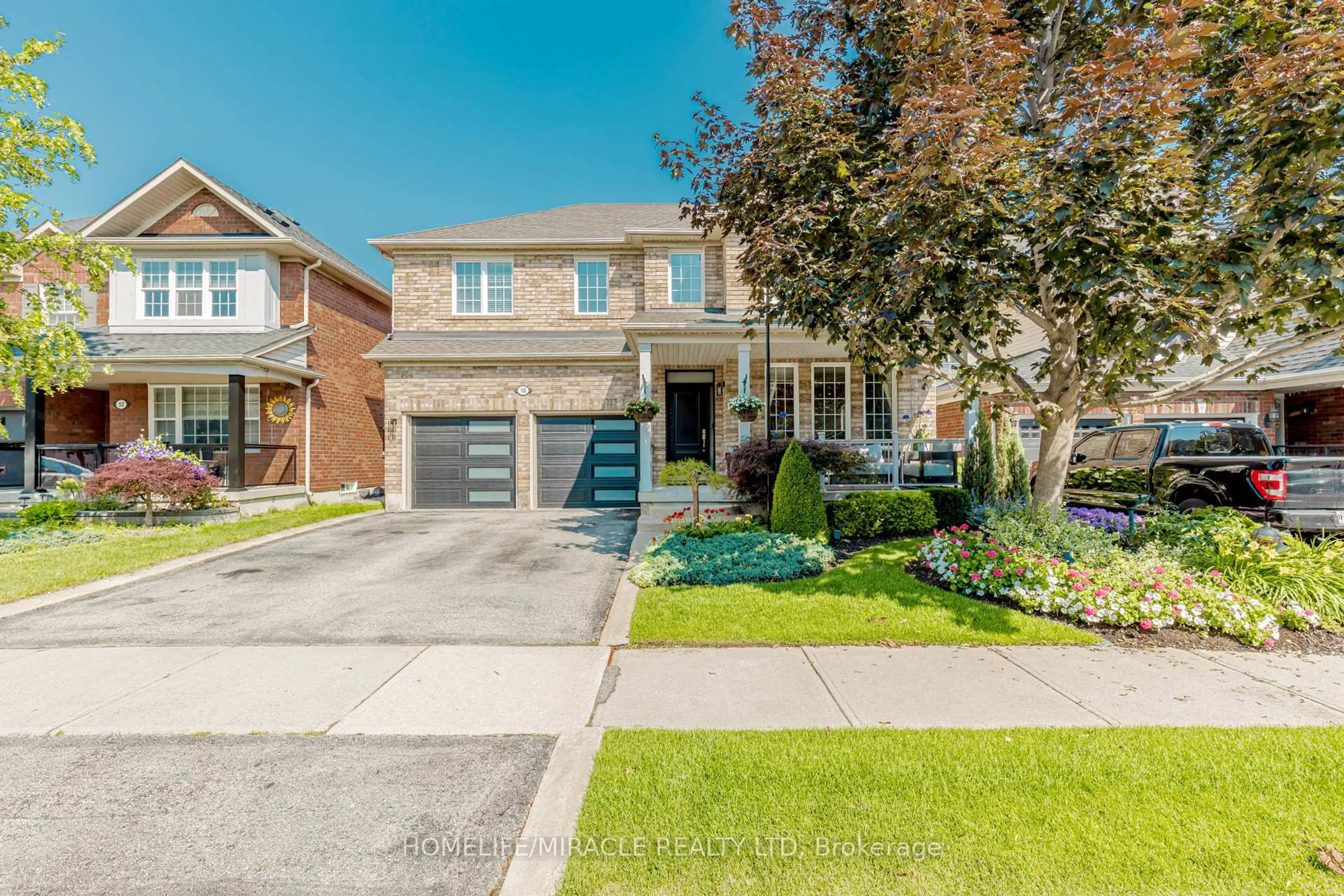 Home with brick exterior material, street for 50 Sandy Beach Rd, Brampton Ontario L7A 2S9
