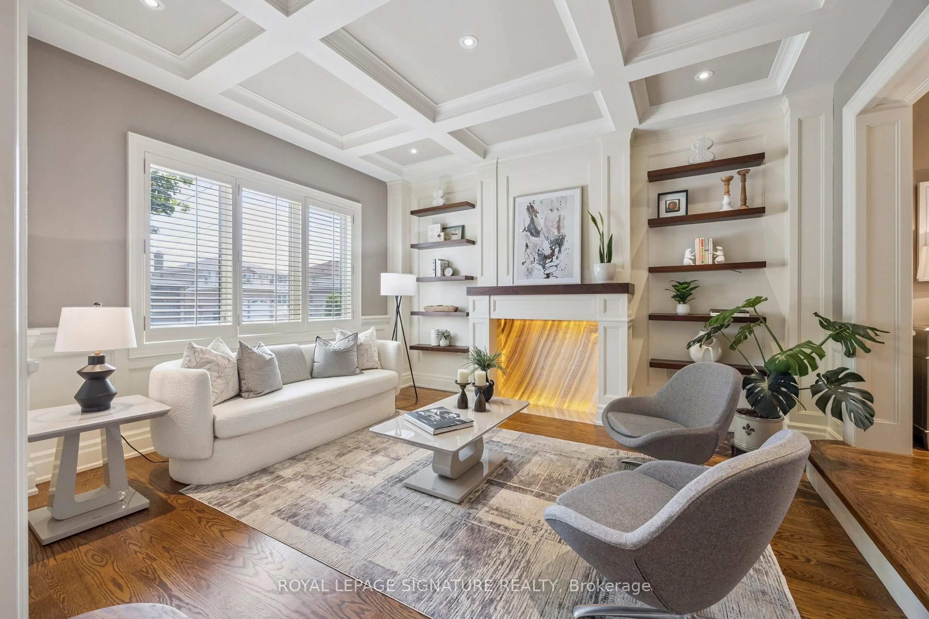 Living room with furniture, wood/laminate floor for 46 Jay St, Toronto Ontario M6L 2M1