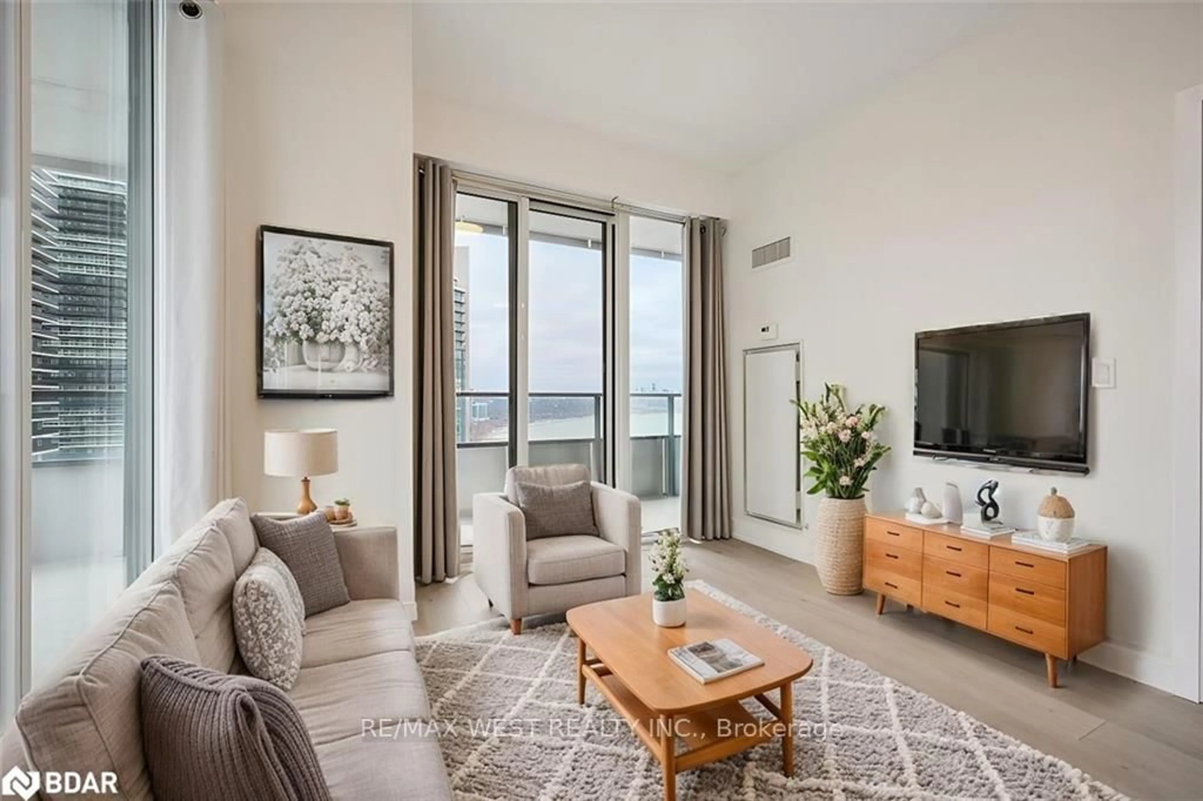 Living room with furniture, unknown for 20 Shore Breeze Dr #2604, Toronto Ontario M8V 0C7