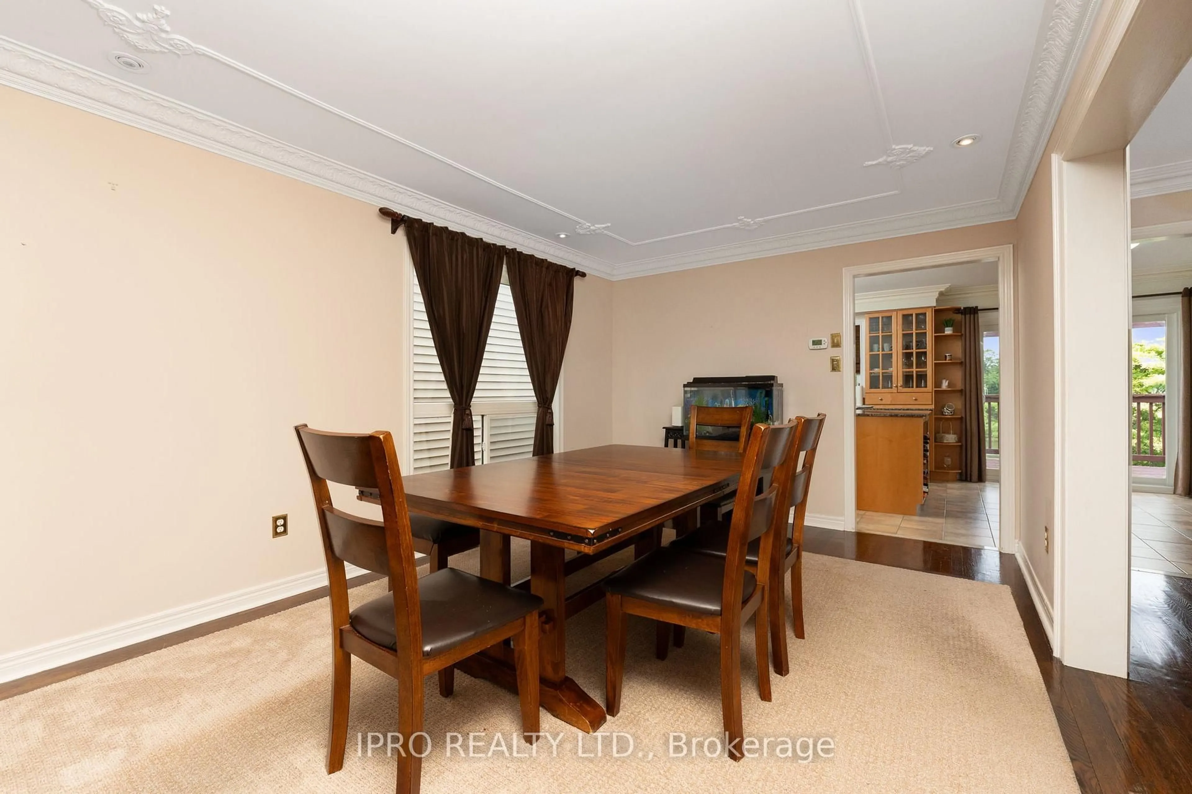 Dining room, wood/laminate floor for 14 Porchlight Rd, Brampton Ontario L6X 4S3