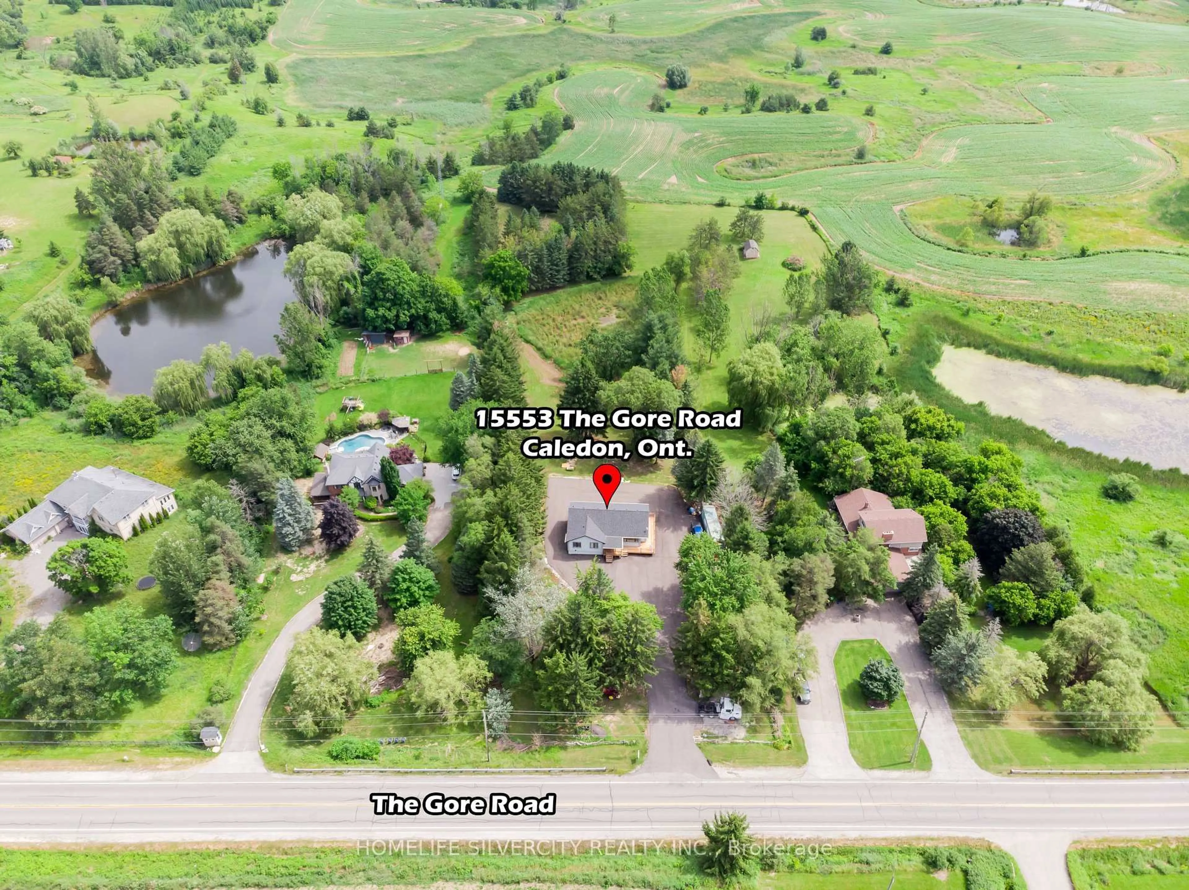 A pic from outside/outdoor area/front of a property/back of a property/a pic from drone, water/lake/river/ocean view for 15553 The Gore Rd, Caledon Ontario L7E 0X3