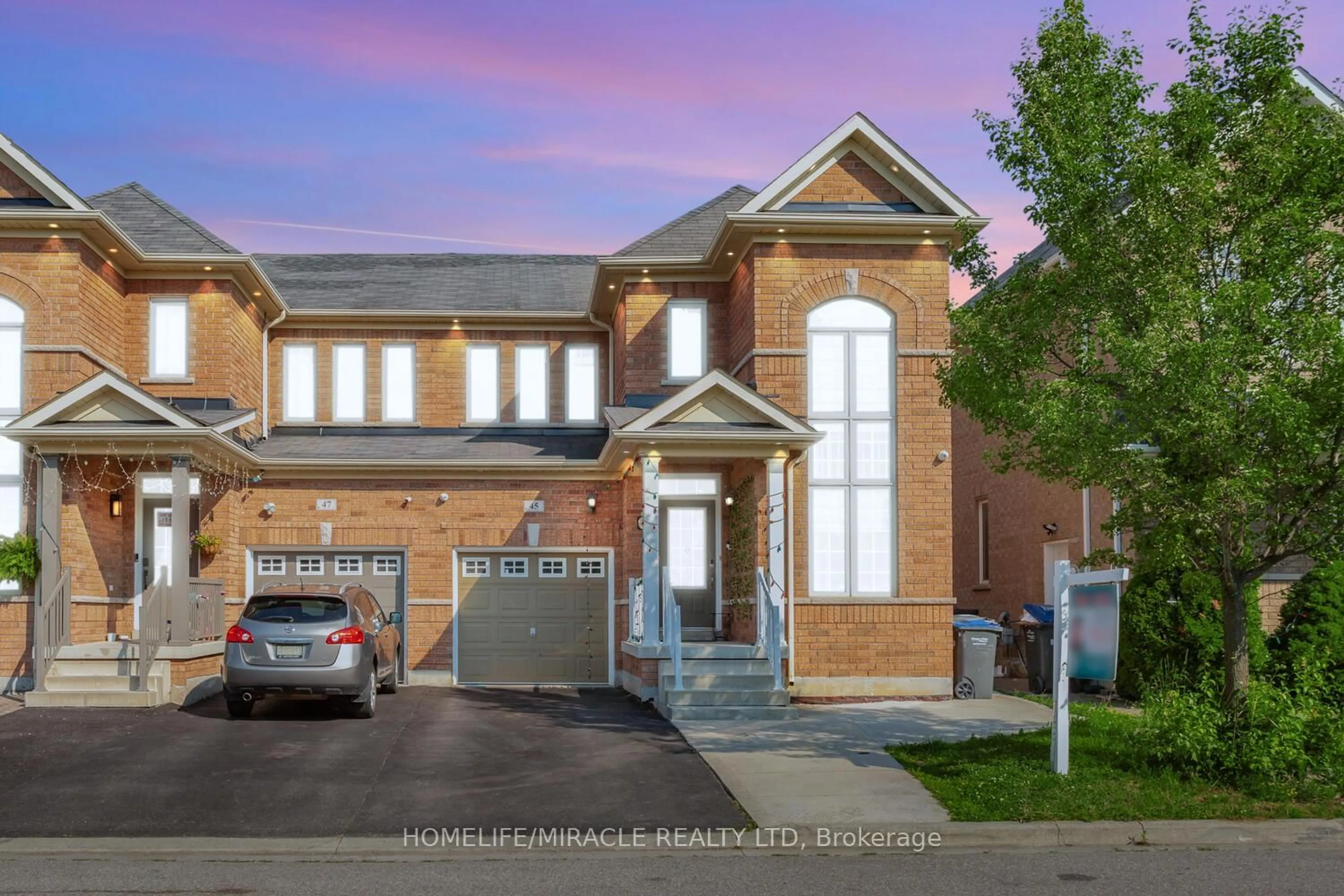 Home with brick exterior material, street for 45 Boundbrook Dr, Brampton Ontario L7A 0M1