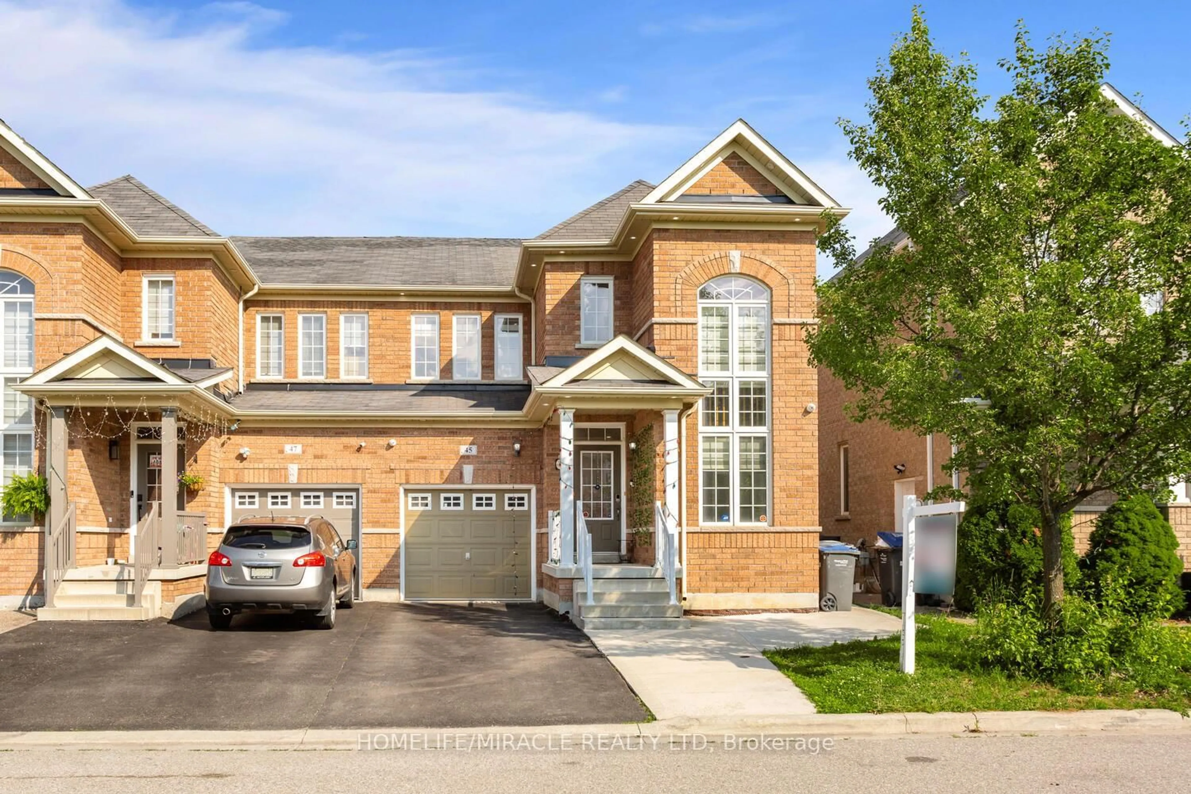 Home with brick exterior material, street for 45 Boundbrook Dr, Brampton Ontario L7A 0M1