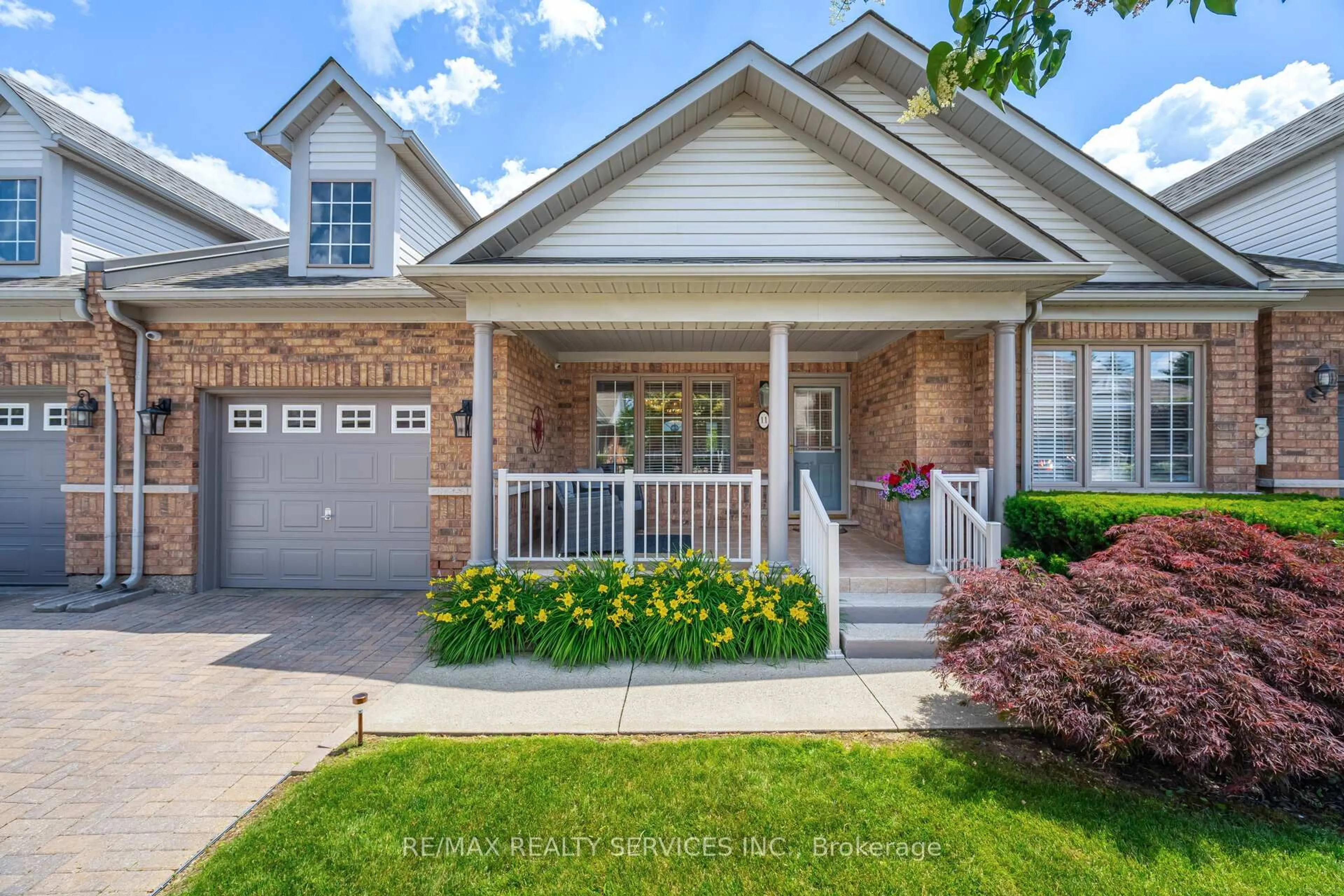 Home with brick exterior material, street for 11 Yorkwood Tr, Brampton Ontario L6R 3J3