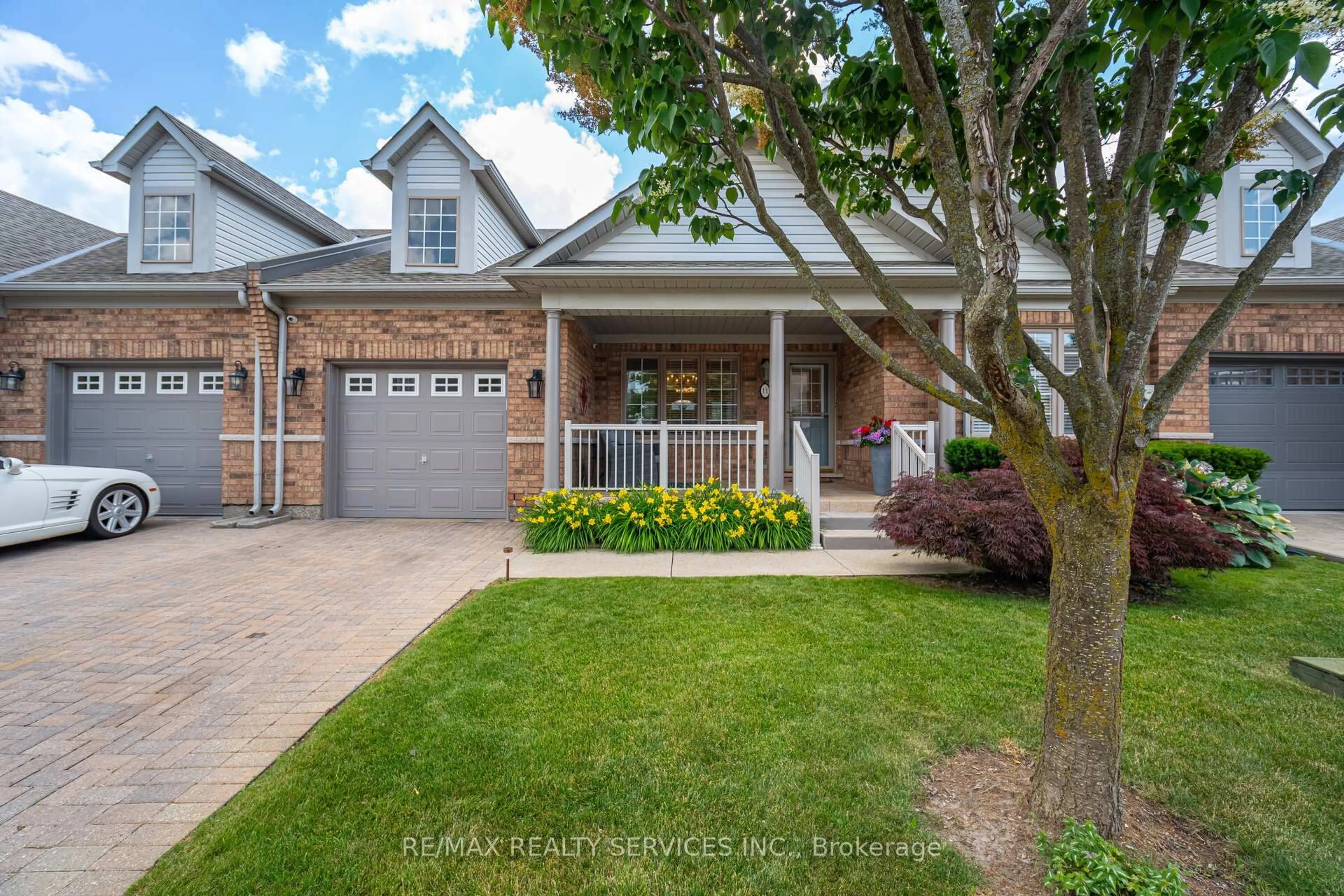 Home with brick exterior material, street for 11 Yorkwood Tr, Brampton Ontario L6R 3J3