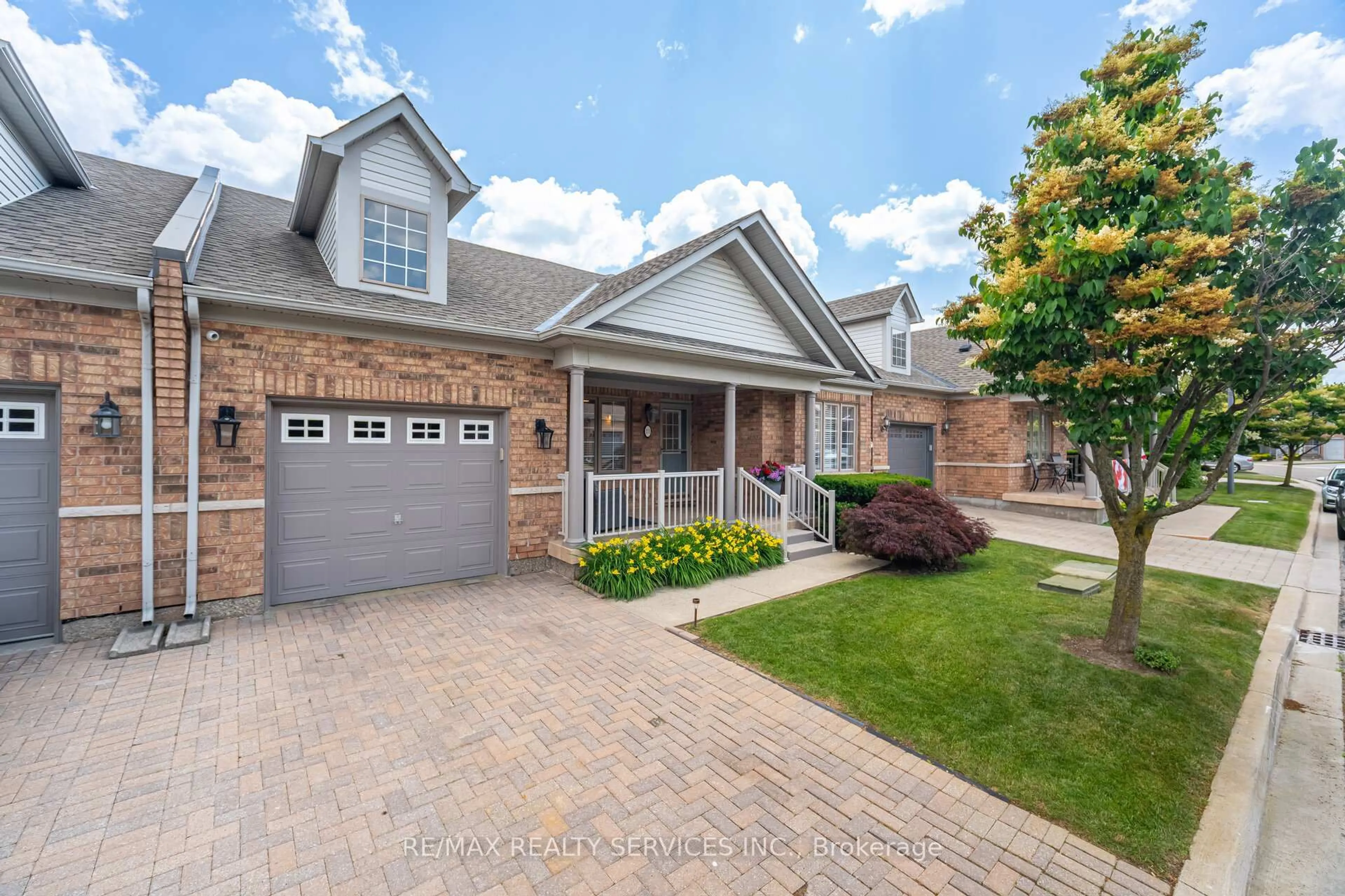 Home with brick exterior material, street for 11 Yorkwood Tr, Brampton Ontario L6R 3J3