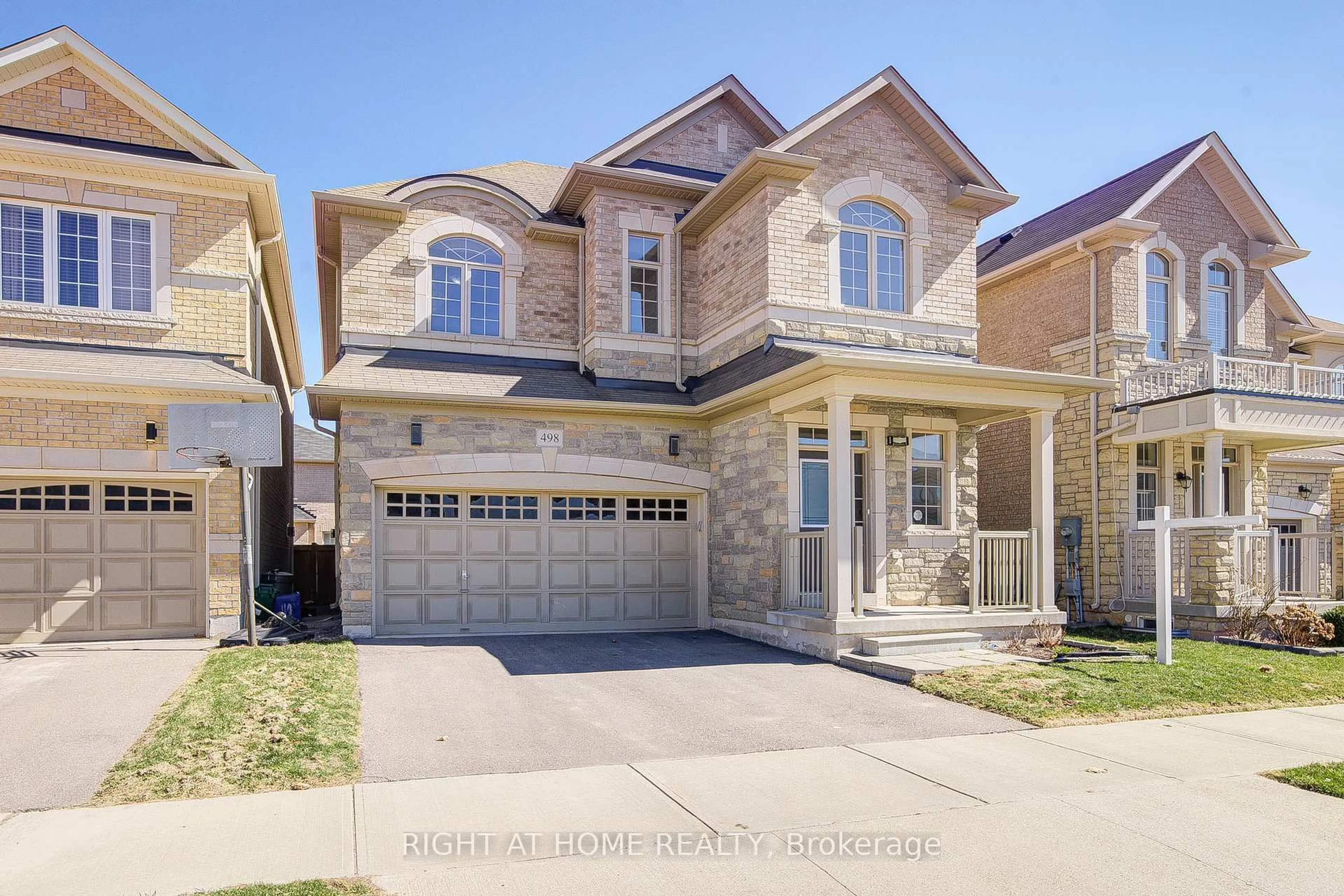 Home with brick exterior material, street for 498 Wheat Boom Dr, Oakville Ontario L6H 0S7