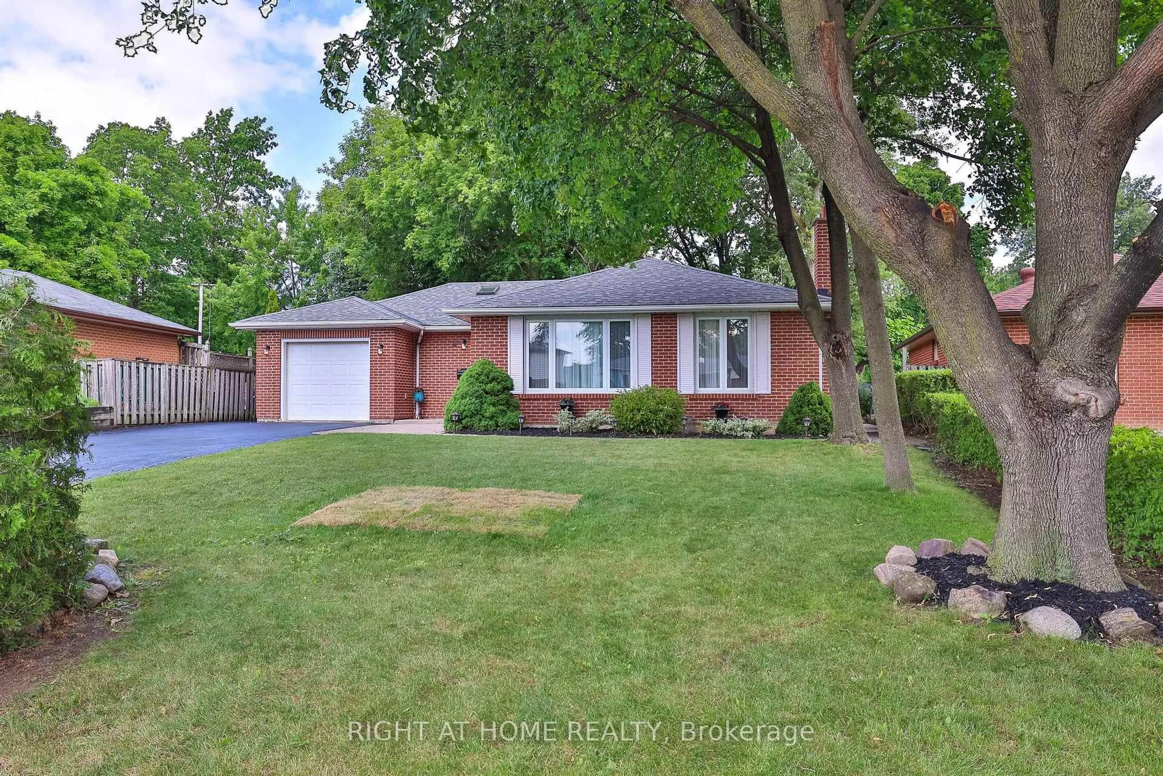 Home with brick exterior material, street for 25 Devonshire Dr, Brampton Ontario L6T 3G5