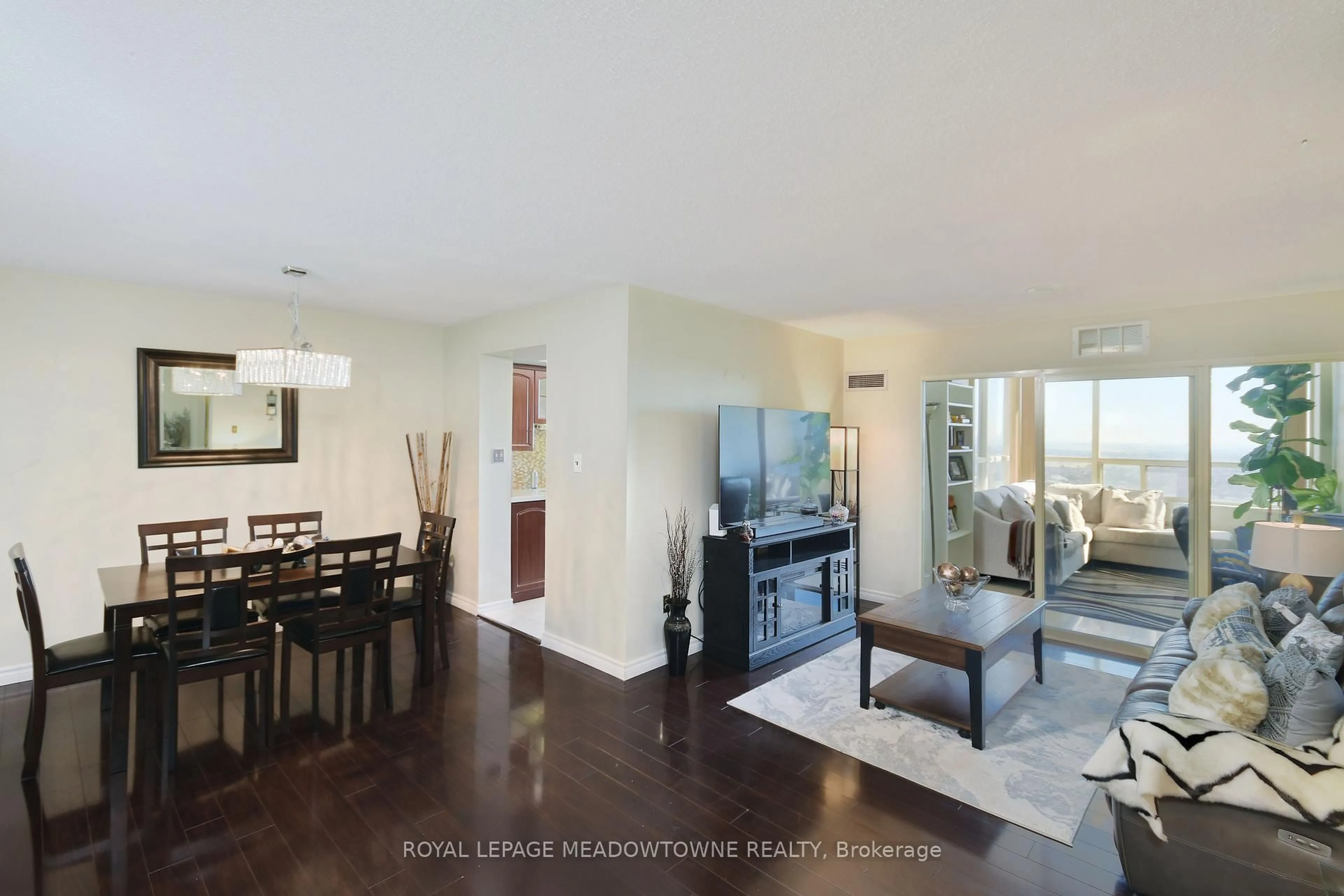 Living room with furniture, wood/laminate floor for 30 Malta Ave #2110, Brampton Ontario L6Y 4S5
