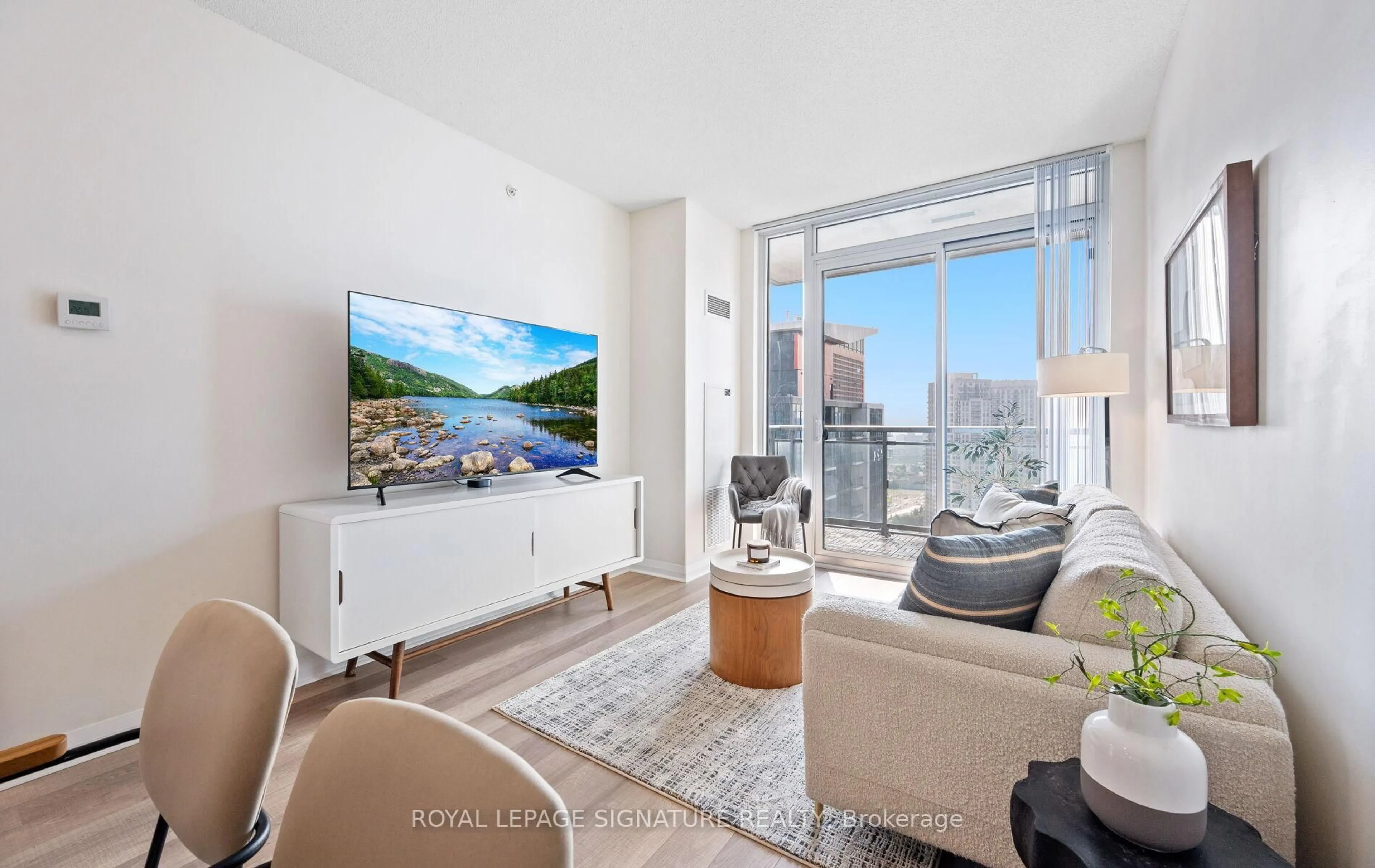 Living room with furniture, unknown for 5025 Four Springs Ave #2404, Mississauga Ontario L5R 0G5