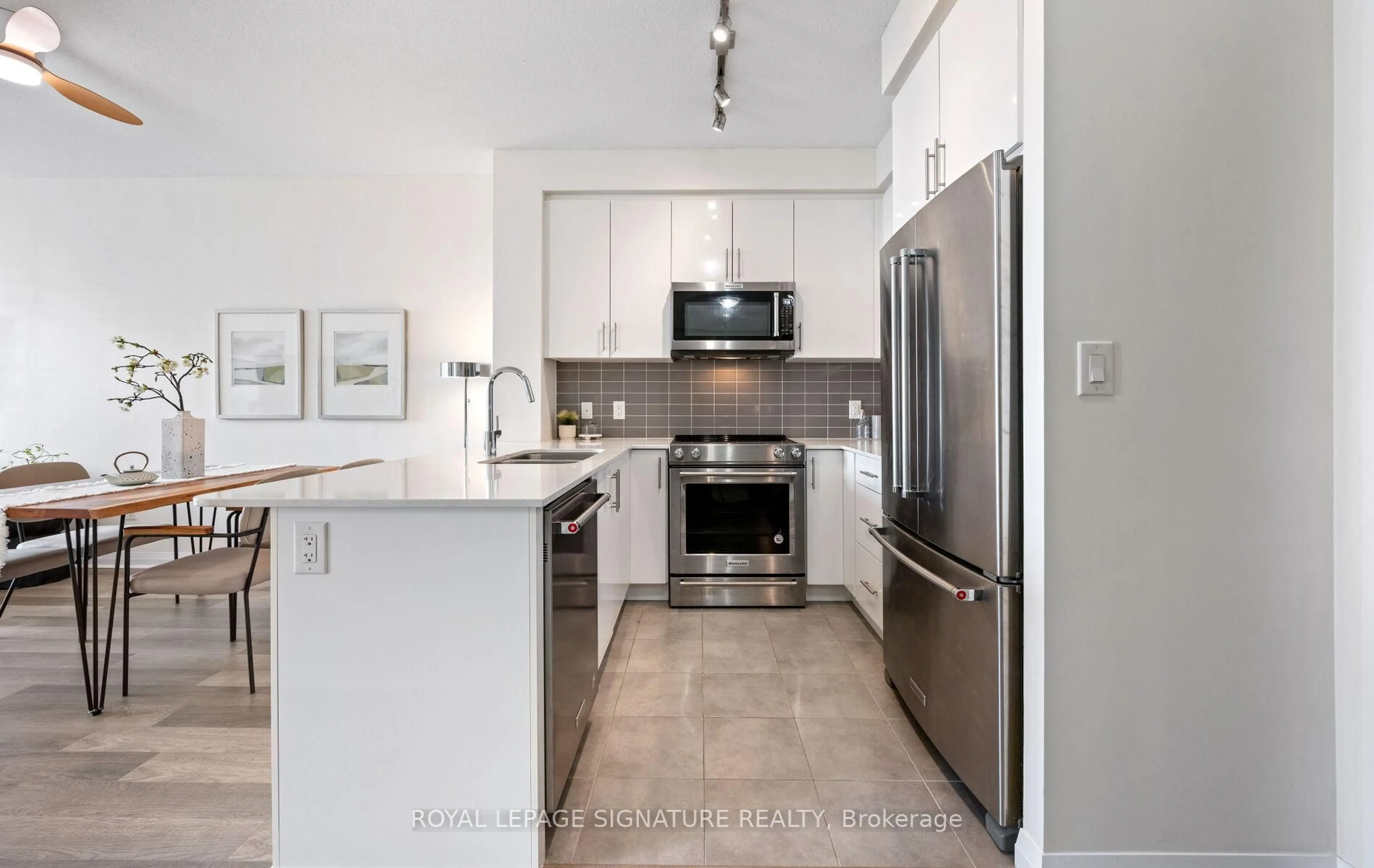 Open concept kitchen, ceramic/tile floor for 5025 Four Springs Ave #2404, Mississauga Ontario L5R 0G5