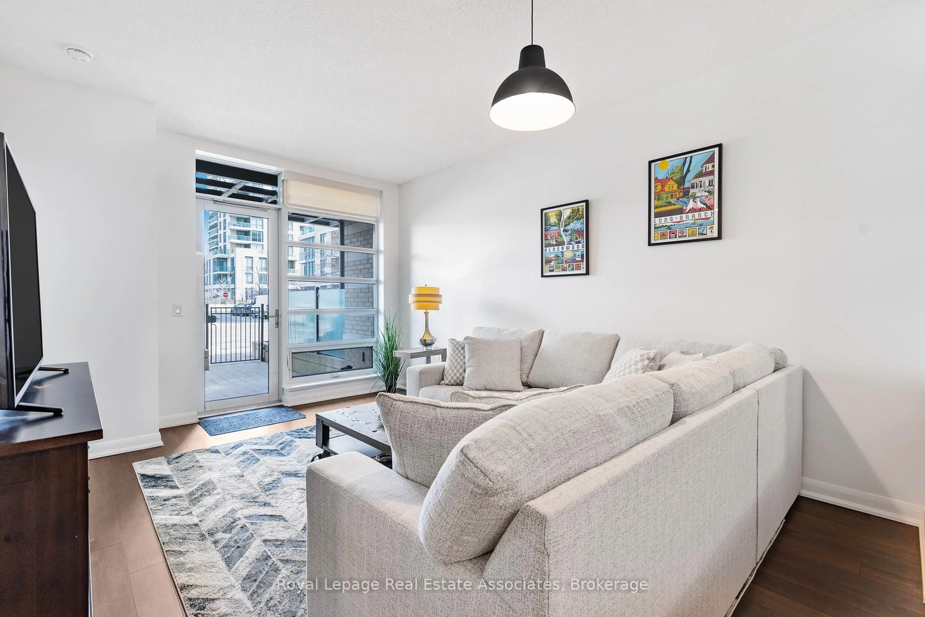 Living room with furniture, unknown for 235 Sherway Gardens Rd #103, Toronto Ontario M9C 0A2