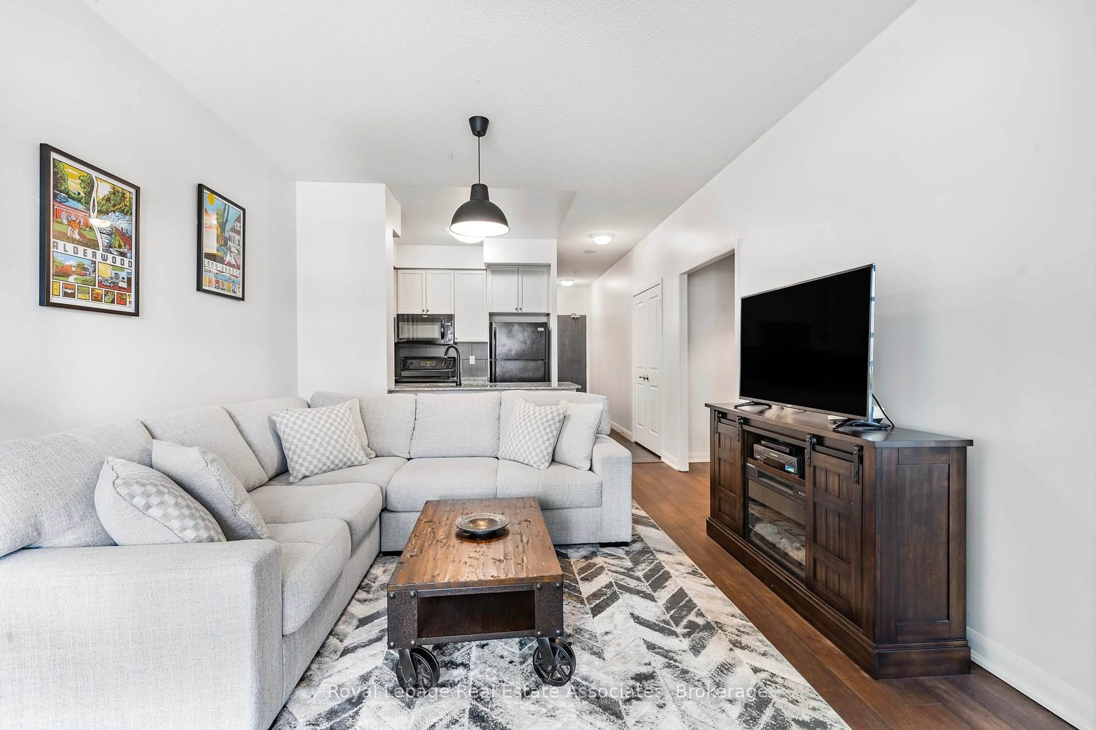 Living room with furniture, unknown for 235 Sherway Gardens Rd #103, Toronto Ontario M9C 0A2
