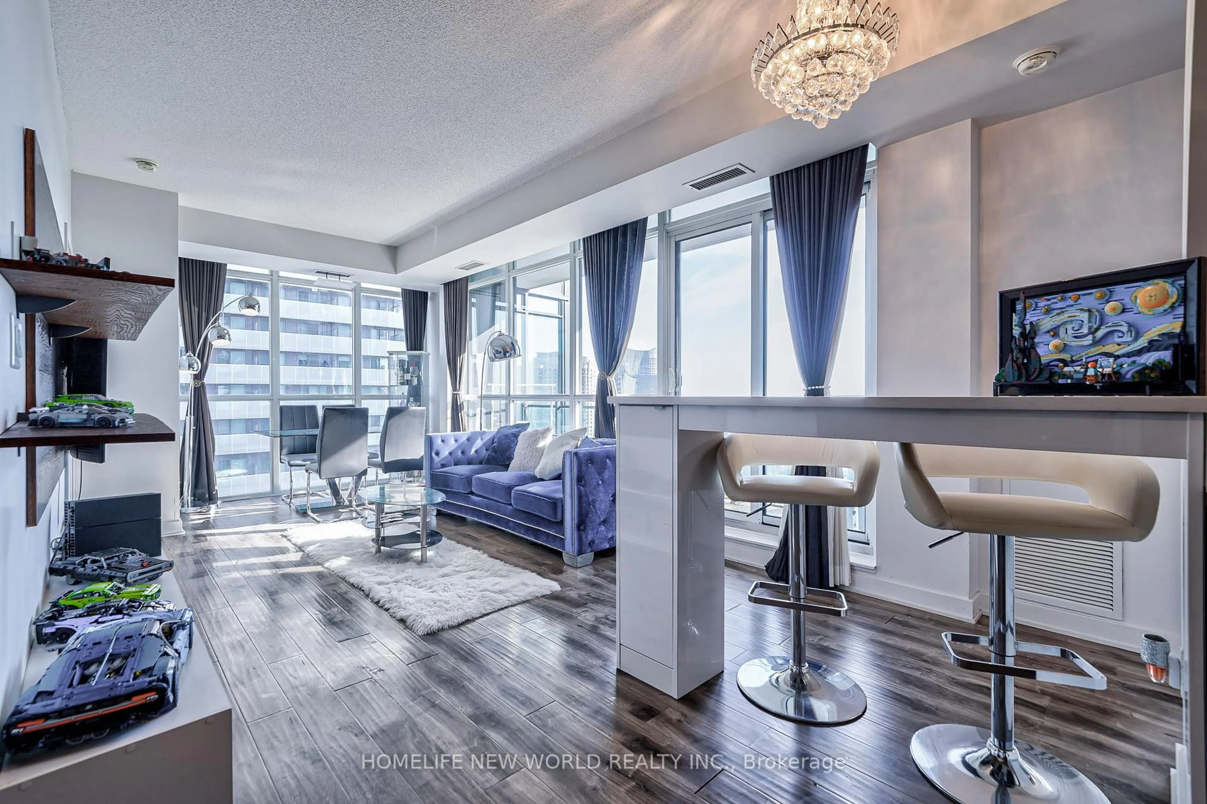 Living room with furniture, unknown for 4070 Confederation Pkwy #2402, Mississauga Ontario L5B 0E9