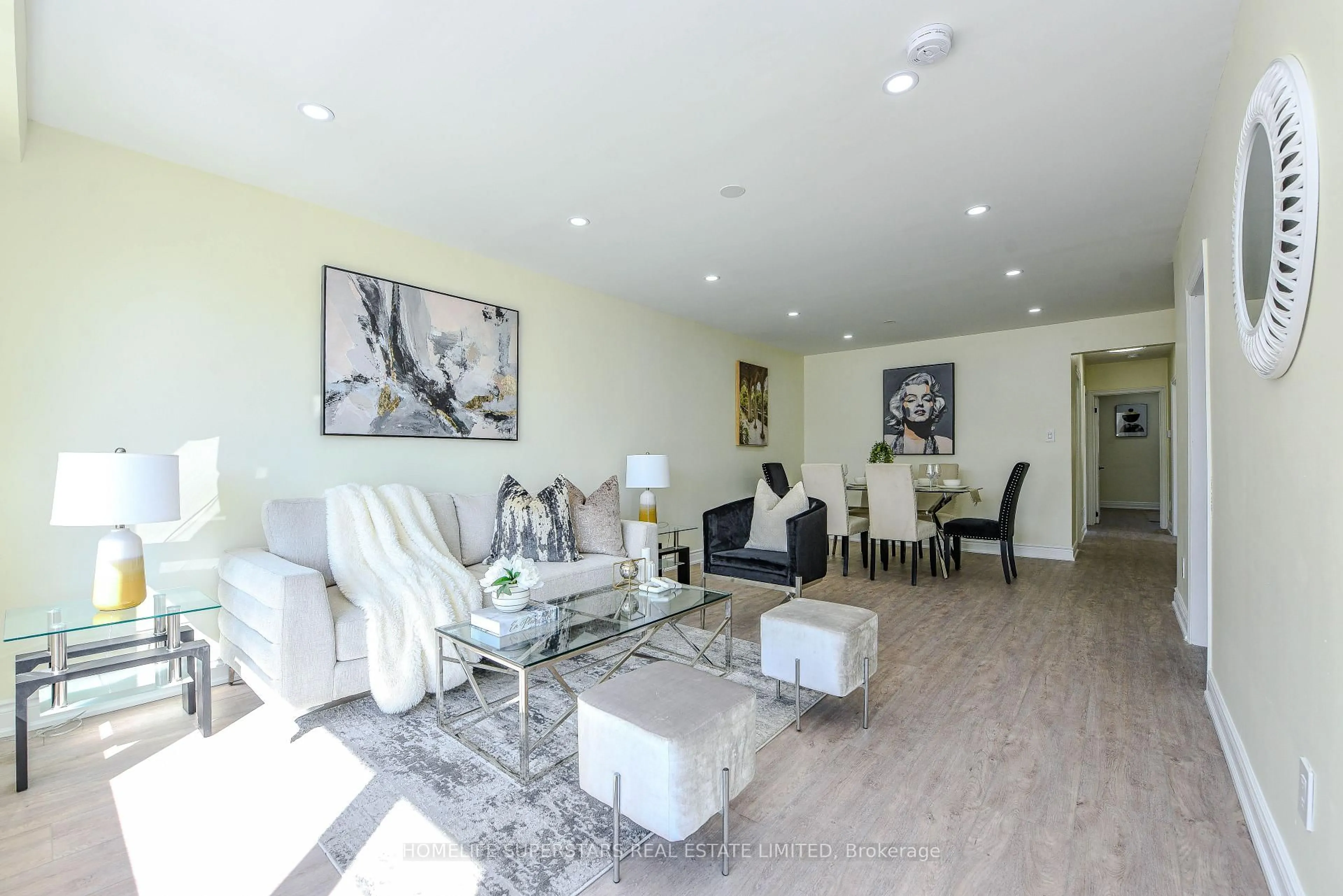 Living room with furniture, wood/laminate floor for 9 Aloma Cres, Brampton Ontario L6T 2N8