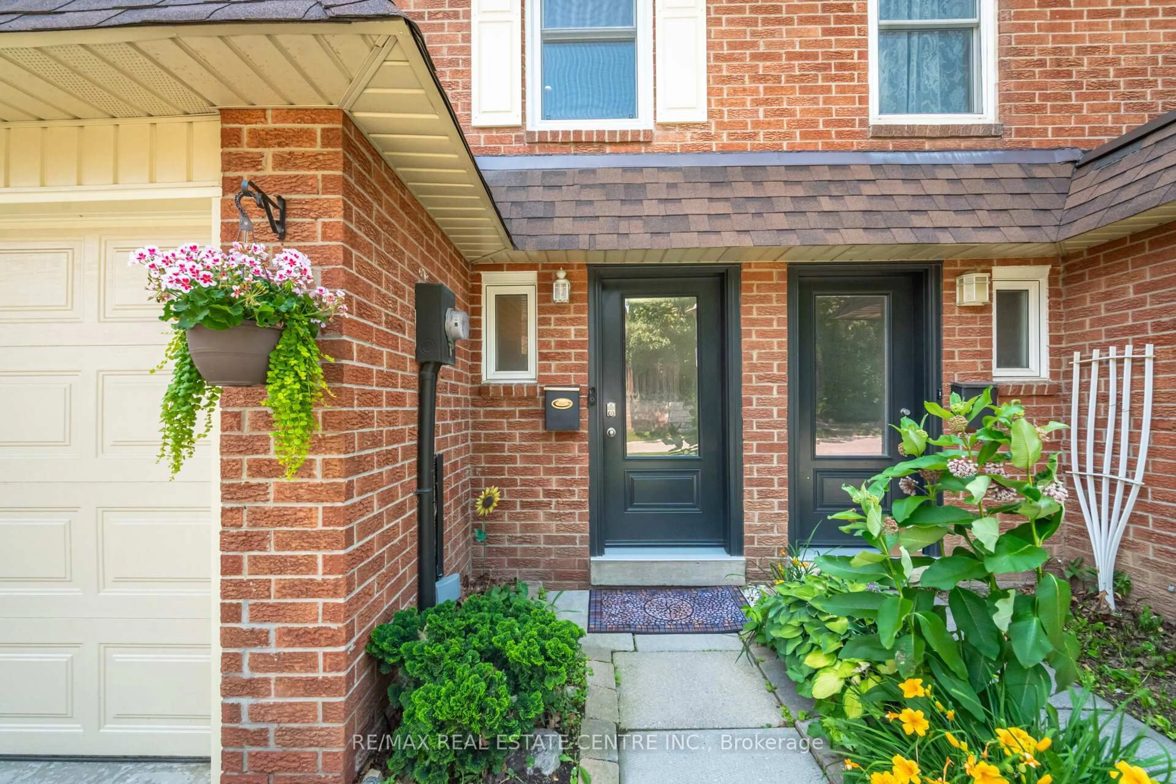 Home with brick exterior material, street for 30 Heslop Rd #34, Milton Ontario L9T 1B3