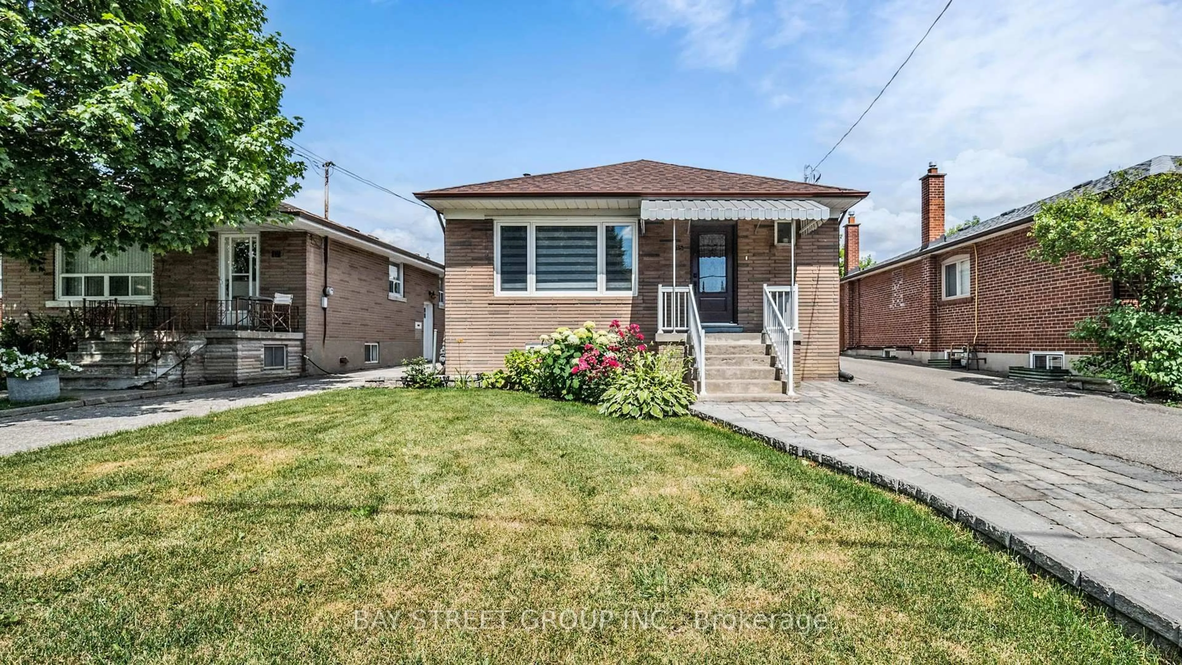 Home with brick exterior material, street for 15 Macleod St, Toronto Ontario M6L 2M7
