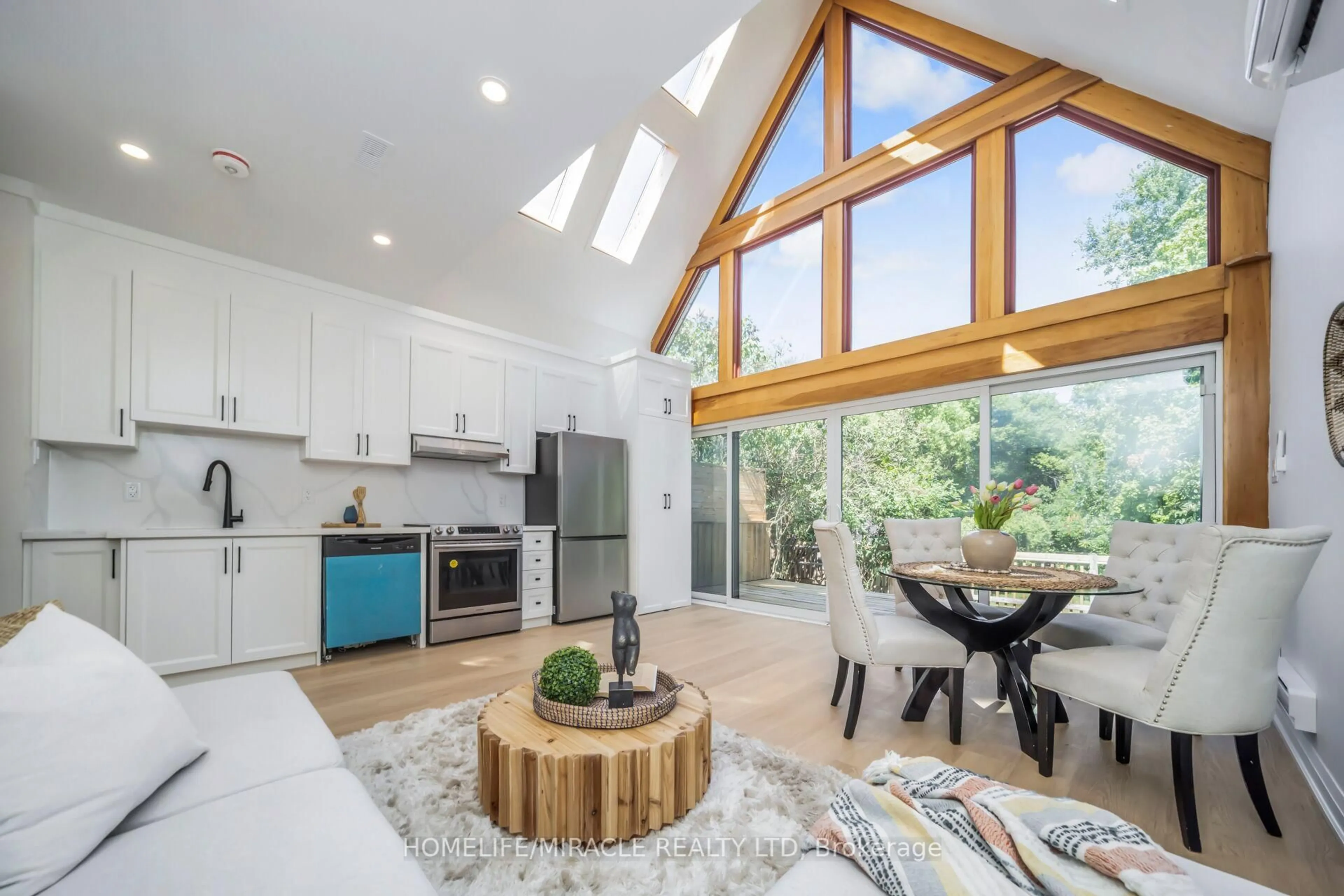 Open concept kitchen, wood/laminate floor for 9 Berry Creek Dr, Toronto Ontario M9W 4A1