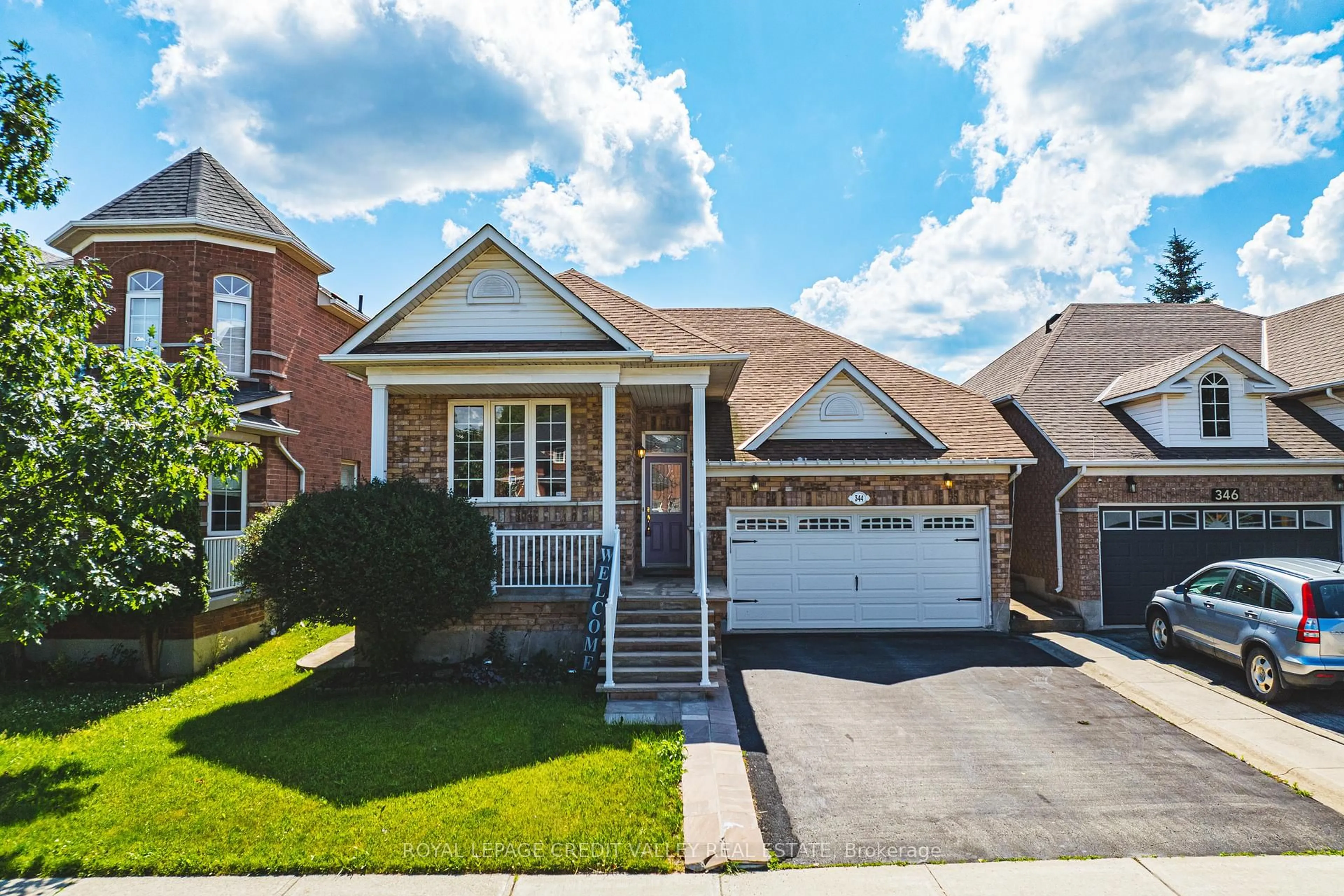 Home with brick exterior material, street for 344 Van Kirk Dr, Brampton Ontario L7A 1V4