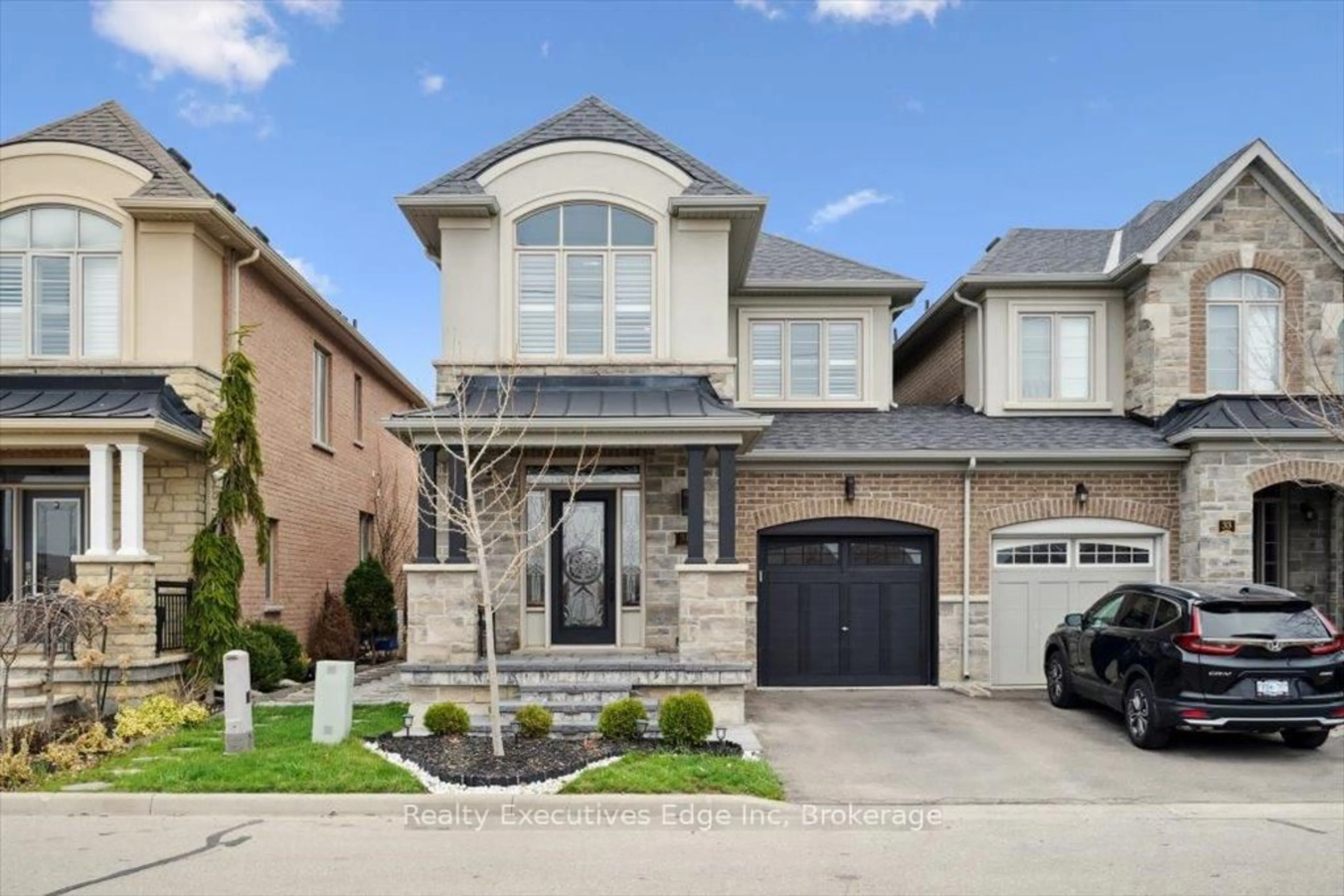 Home with brick exterior material, street for 31 Rainforest Lane, Halton Hills Ontario L7G 0L8