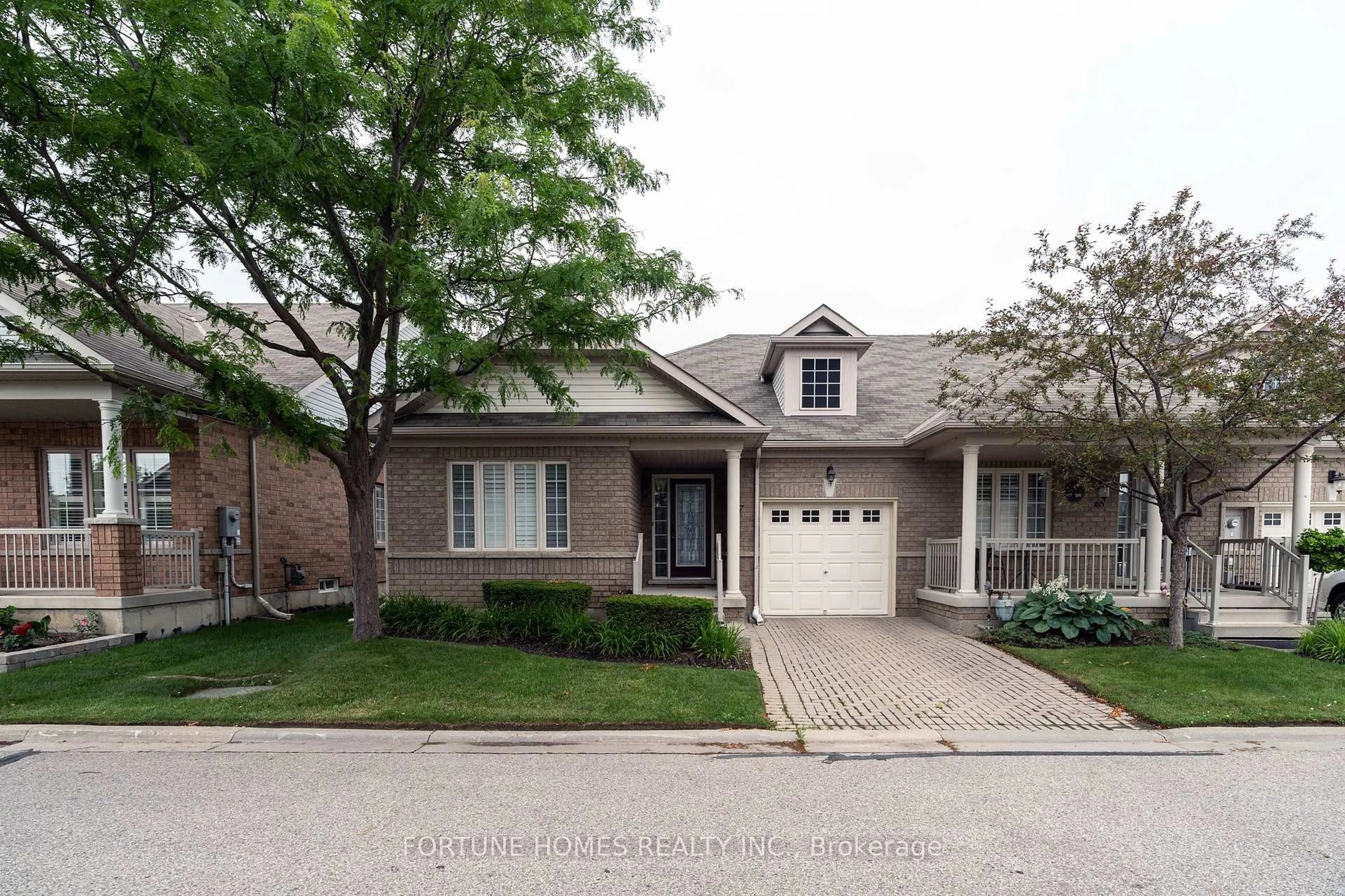 Home with brick exterior material, street for 67 Locust Dr, Brampton Ontario L6R 0W2