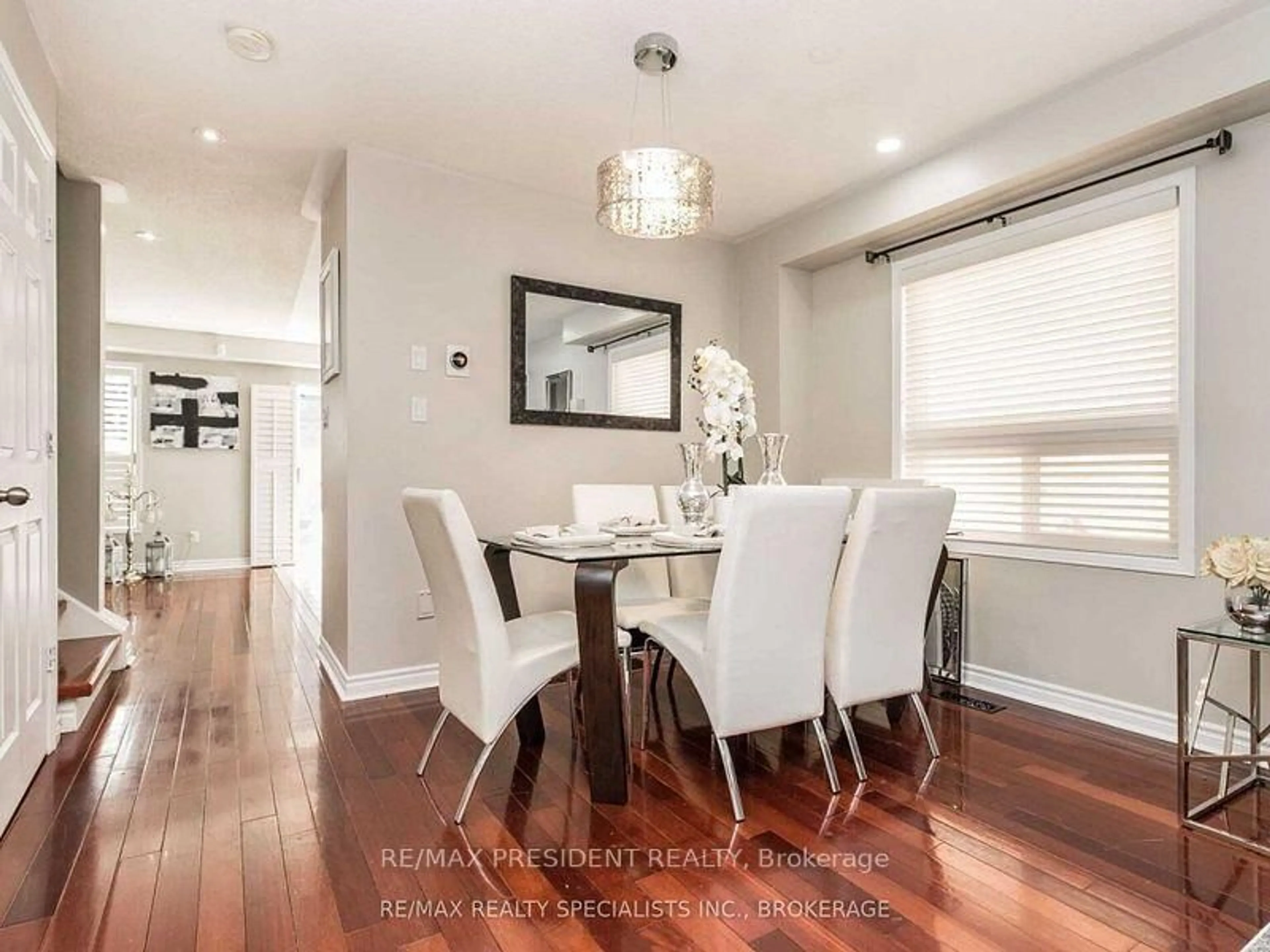 Dining room, wood/laminate floor for 52 Four Seasons Circ, Brampton Ontario L7A 2A7