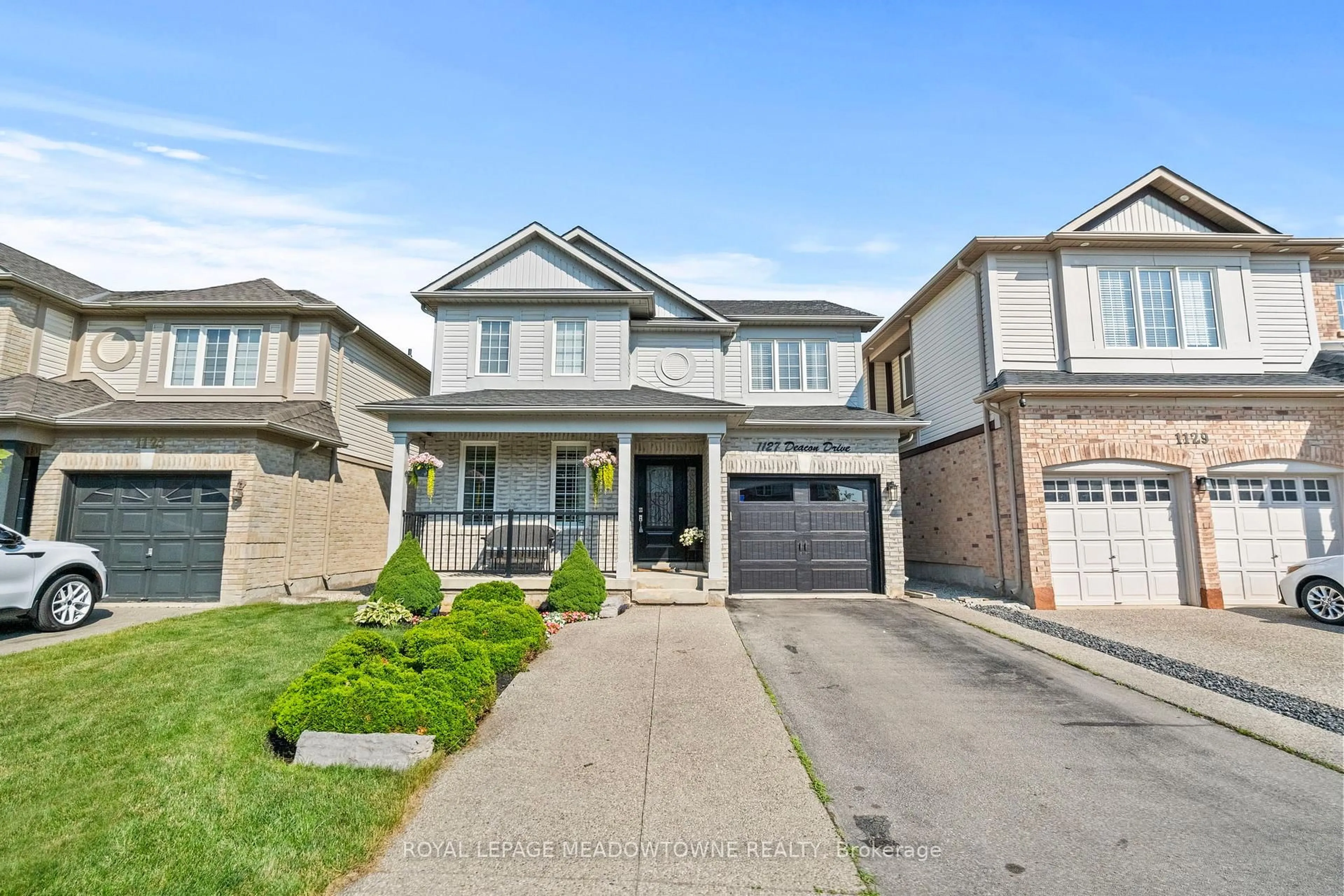 Home with brick exterior material, street for 1127 Deacon Dr, Milton Ontario L9T 5T1