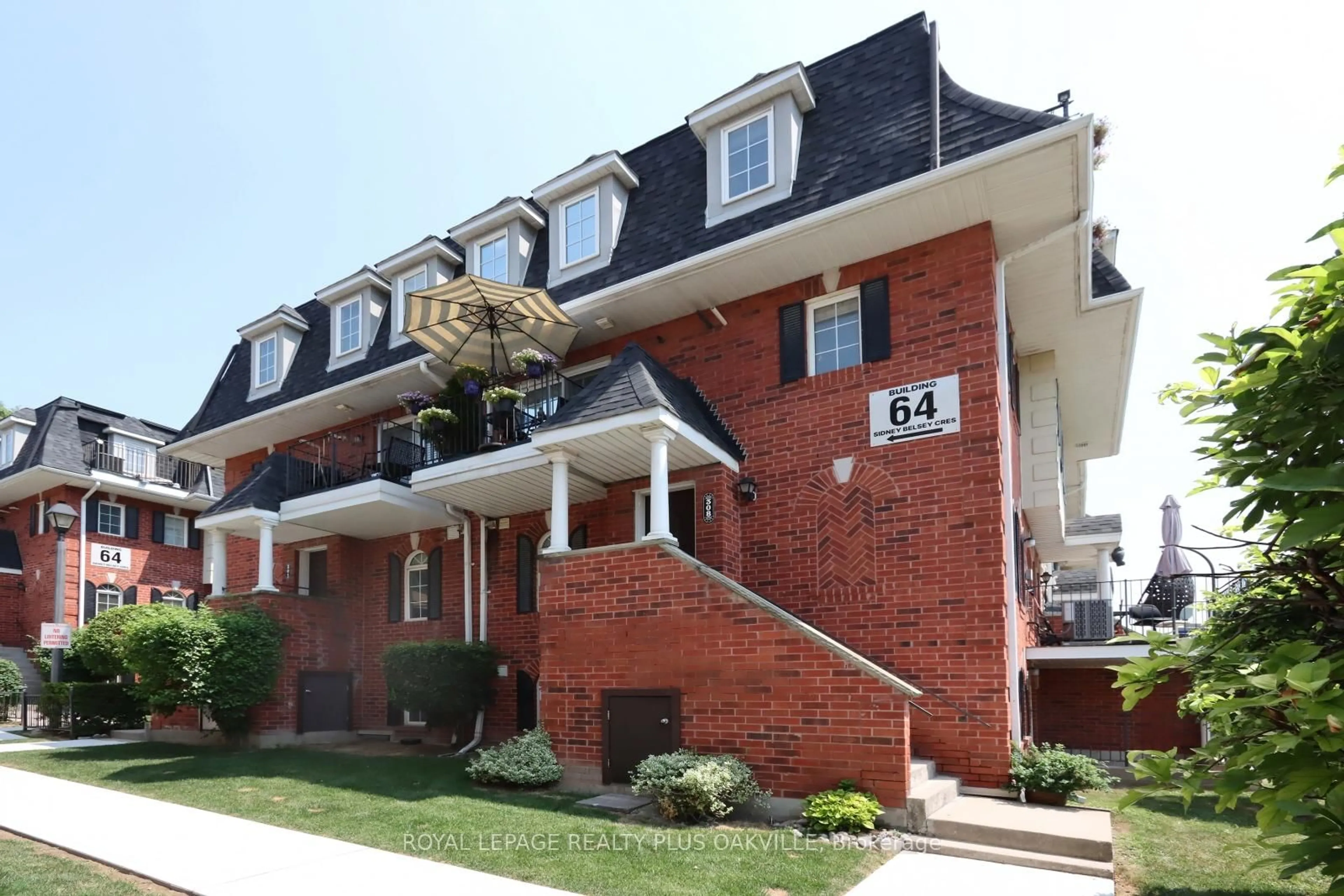 Home with brick exterior material, street for 66 Sidney Belsey Cres #308, Toronto Ontario M6M 5J4