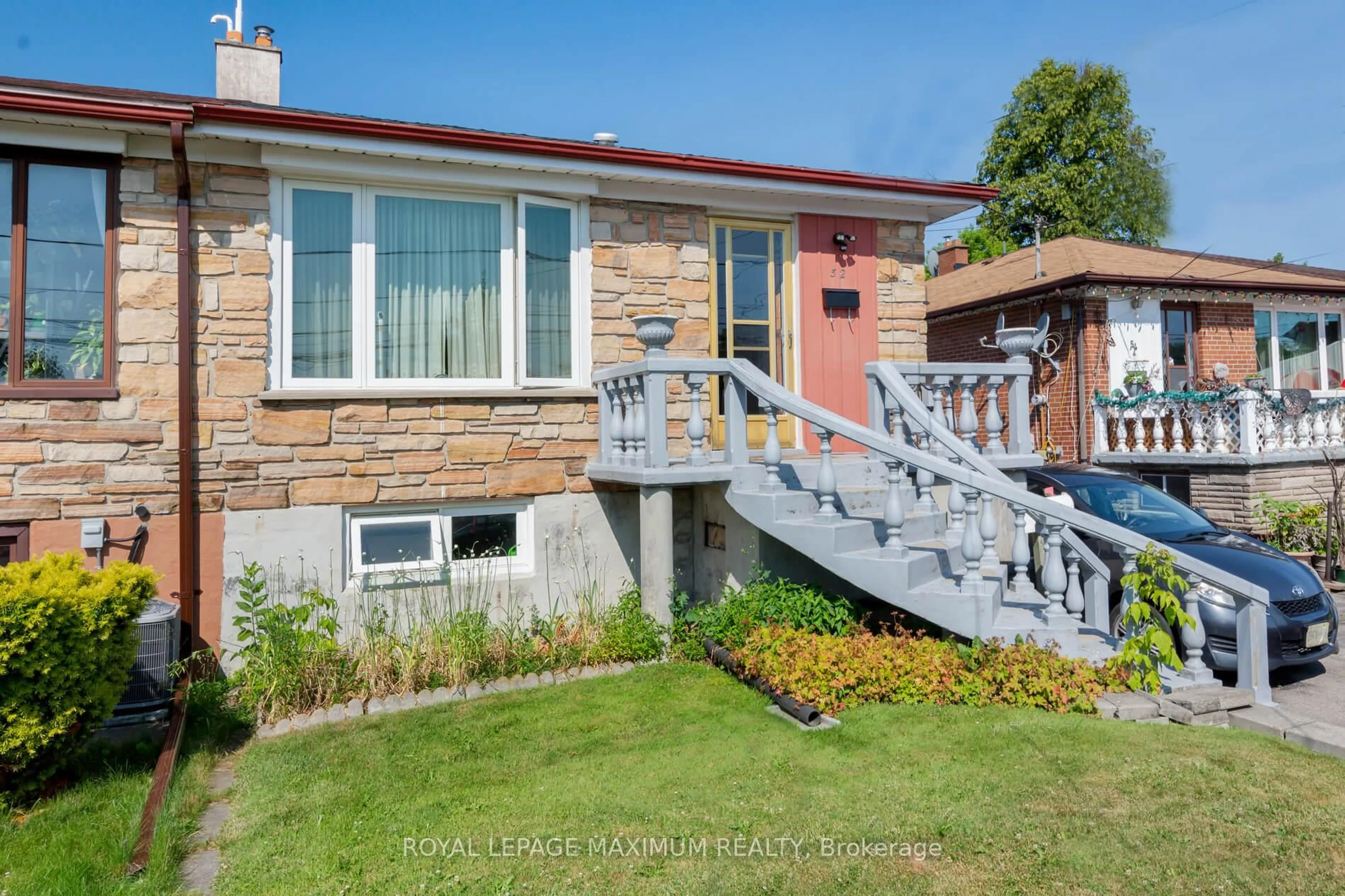 Home with brick exterior material, street for 52 Seacliff Blvd, Toronto Ontario M9L 2G4