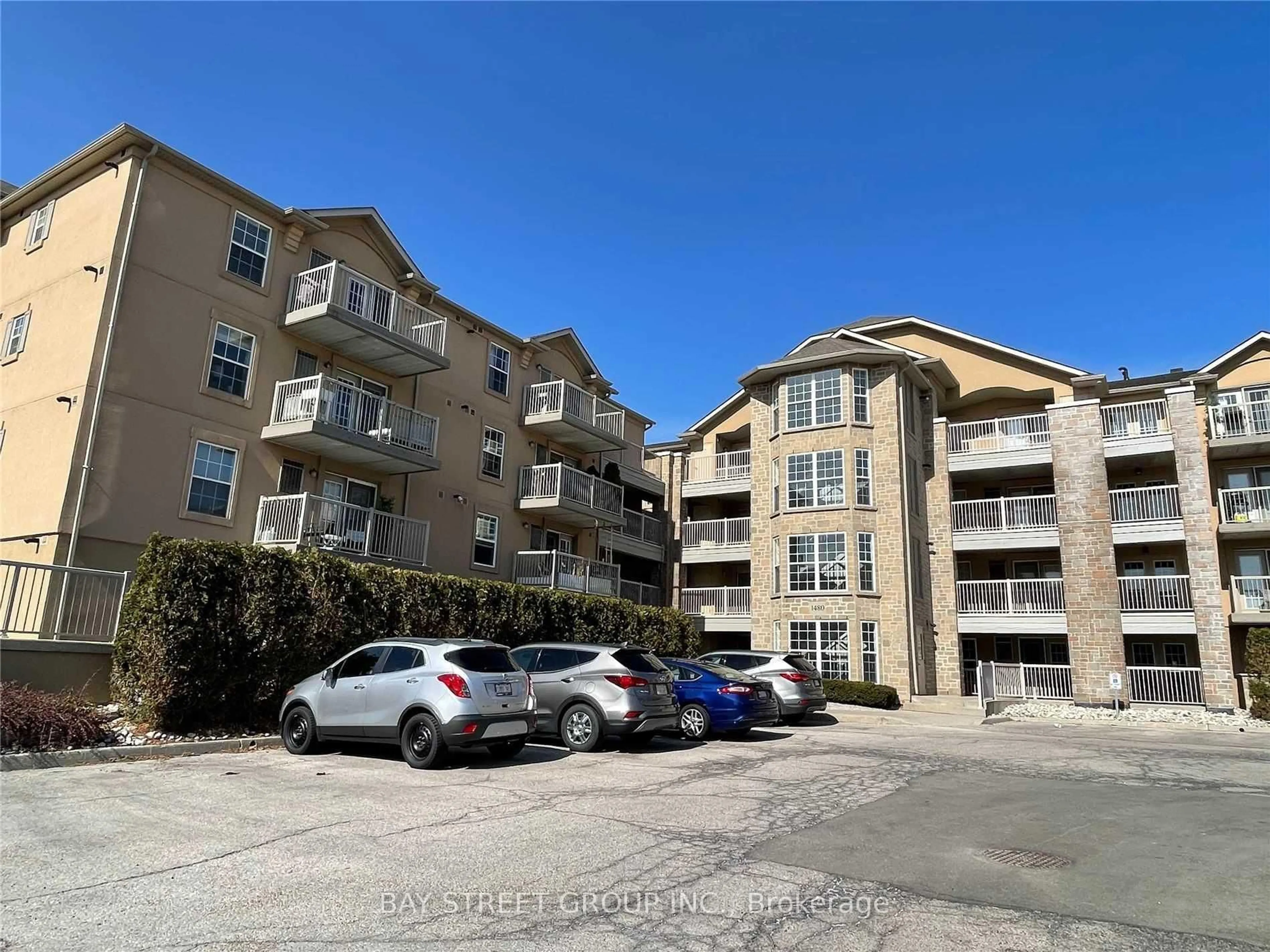 A pic from outside/outdoor area/front of a property/back of a property/a pic from drone, street for 1480 Bishops Gate #216, Oakville Ontario L6M 4N4