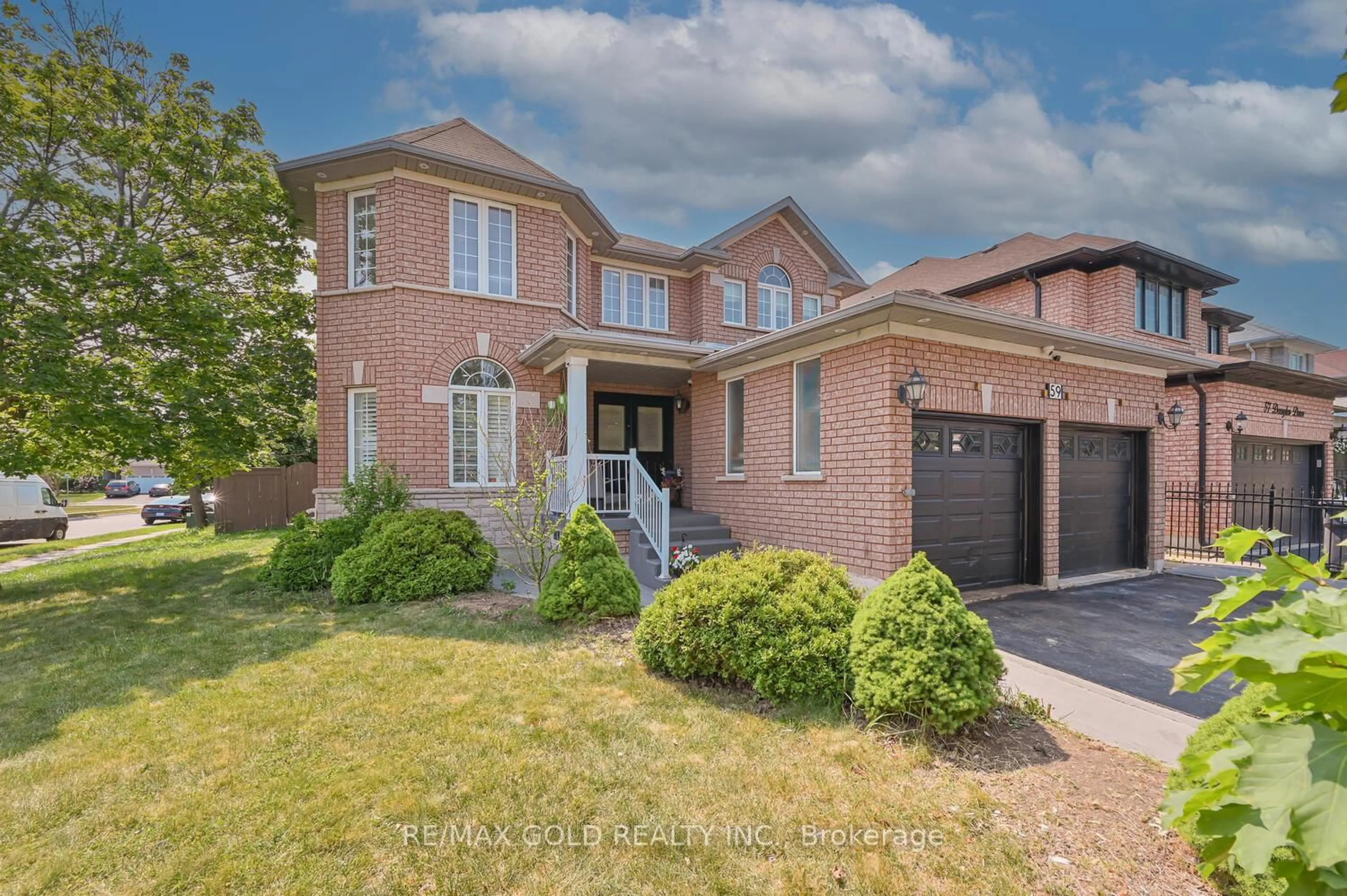 Home with brick exterior material, street for 59 Deerglen Dr, Brampton Ontario L6R 1M3