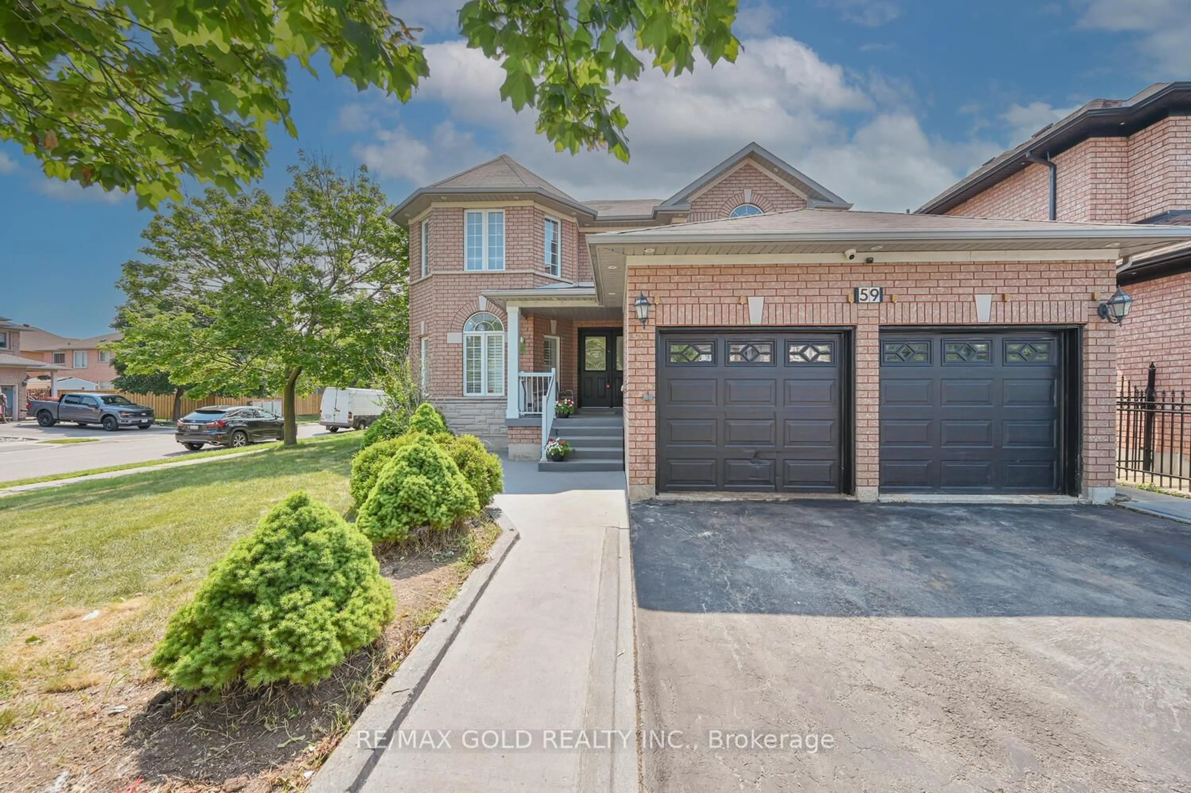Home with brick exterior material, street for 59 Deerglen Dr, Brampton Ontario L6R 1M3