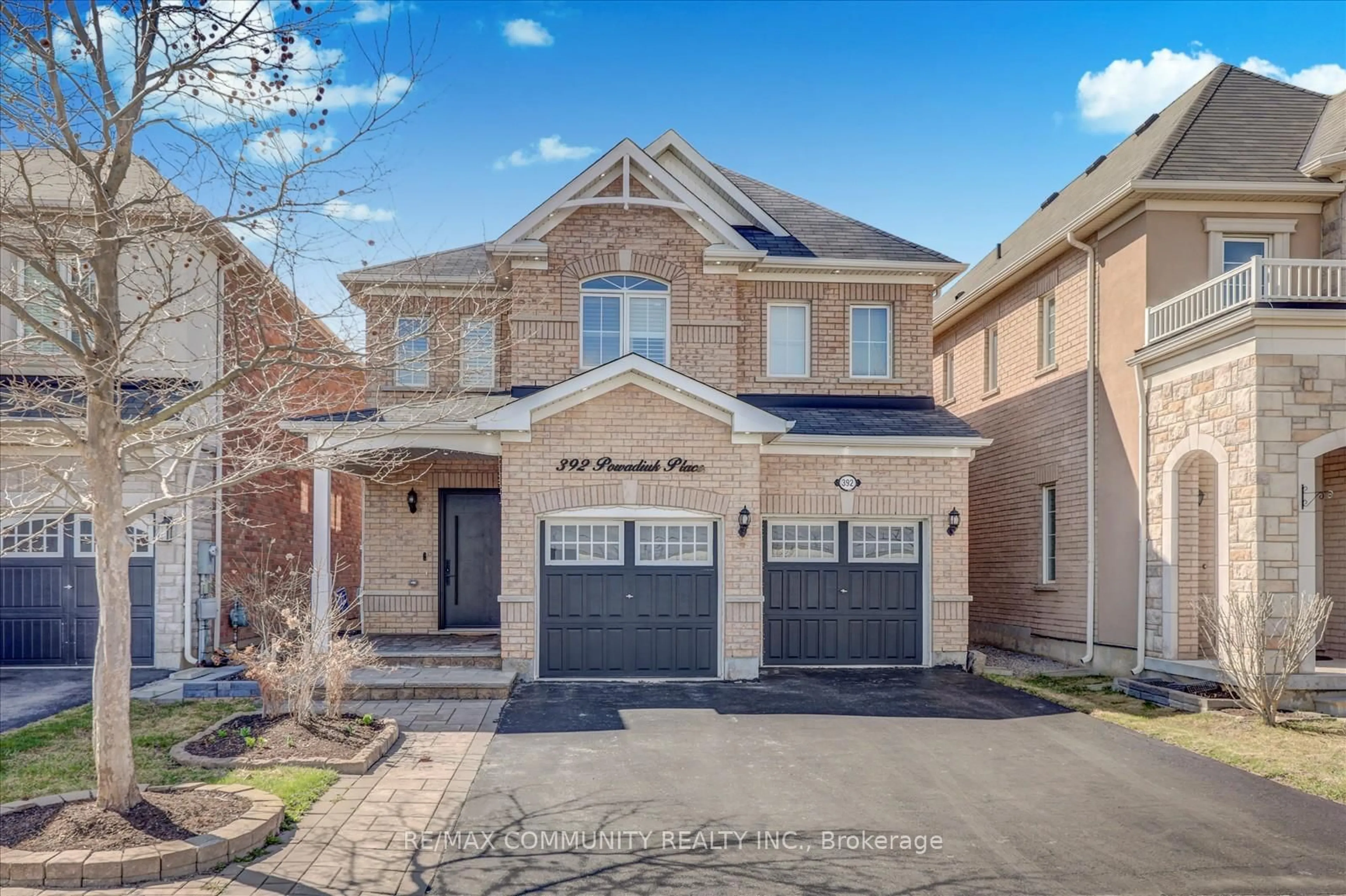 Home with brick exterior material, street for 392 Powadiuk Pl, Milton Ontario L9T 8Y2