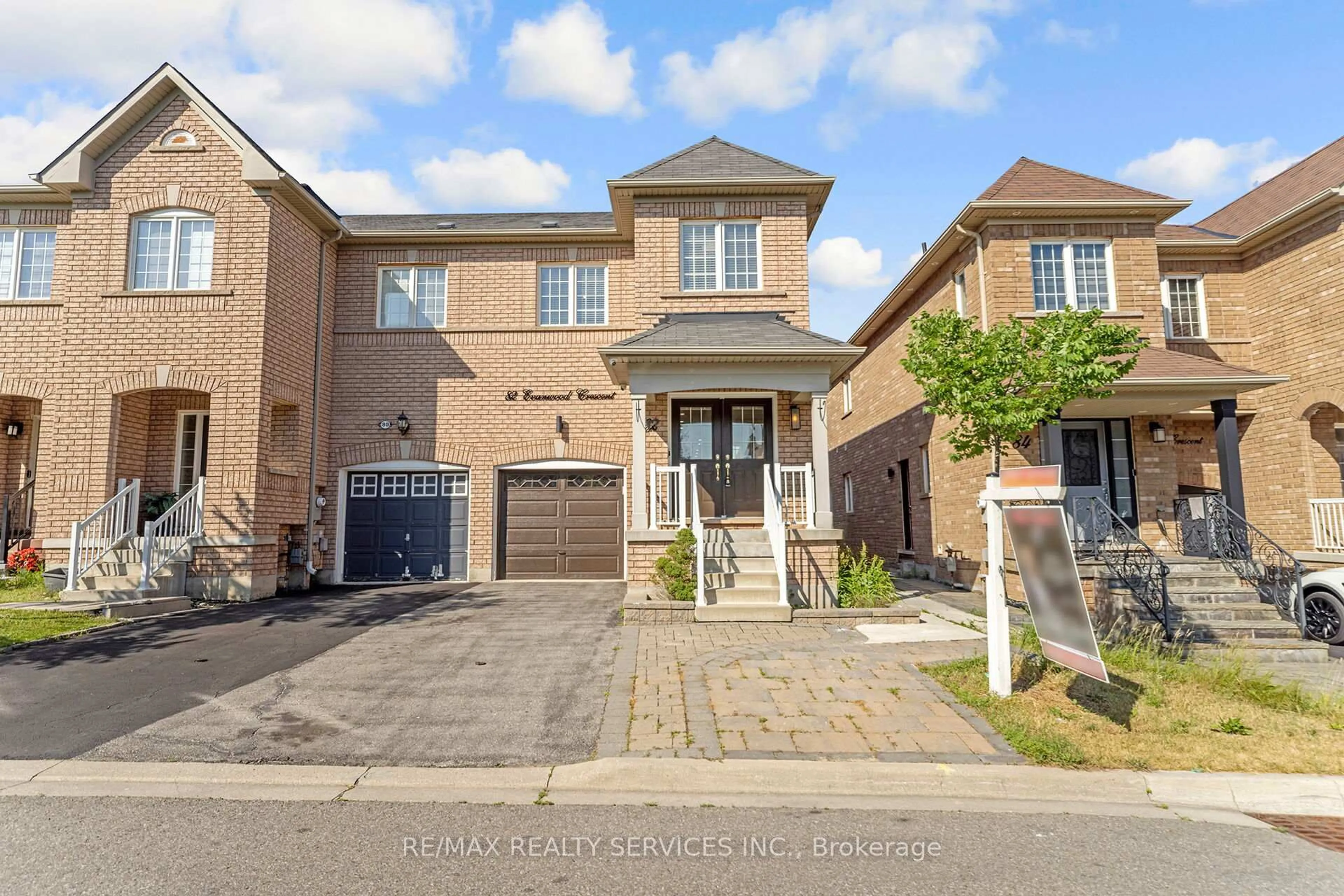 Home with brick exterior material, street for 82 Evanwood Cres, Brampton Ontario L6X 0P7