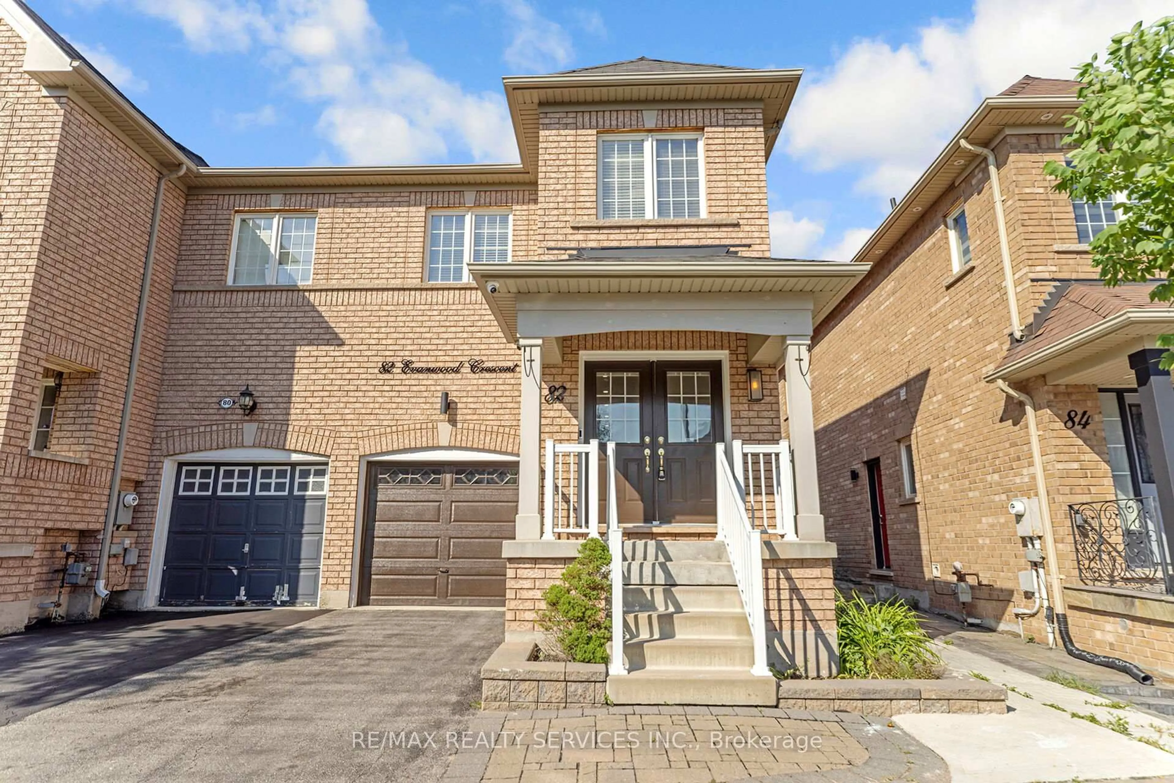 Home with brick exterior material, street for 82 Evanwood Cres, Brampton Ontario L6X 0P7