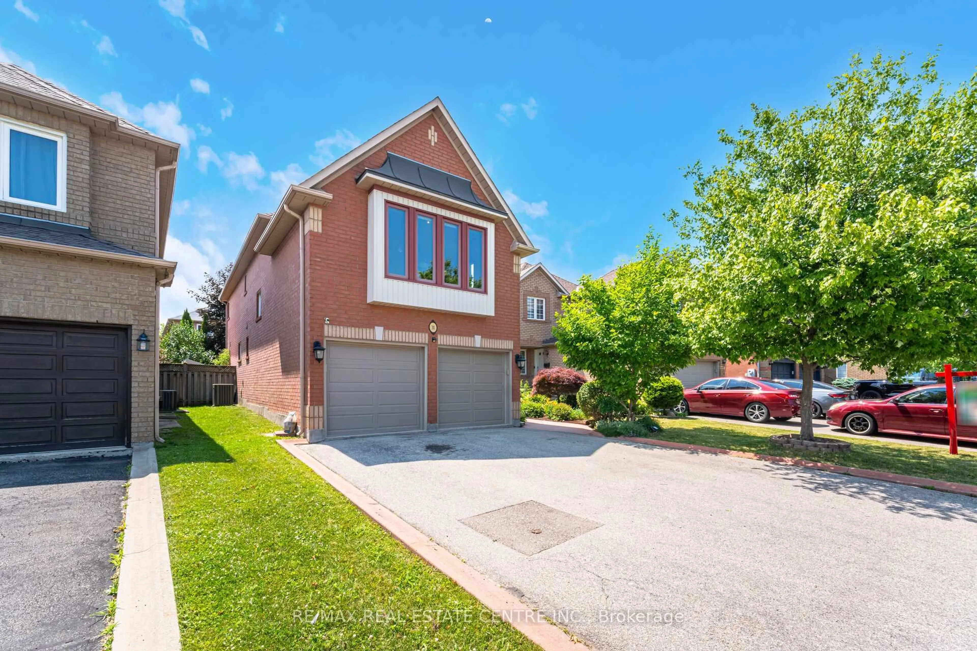 Home with brick exterior material, street for 30 Creekwood Dr, Brampton Ontario L7A 1J3
