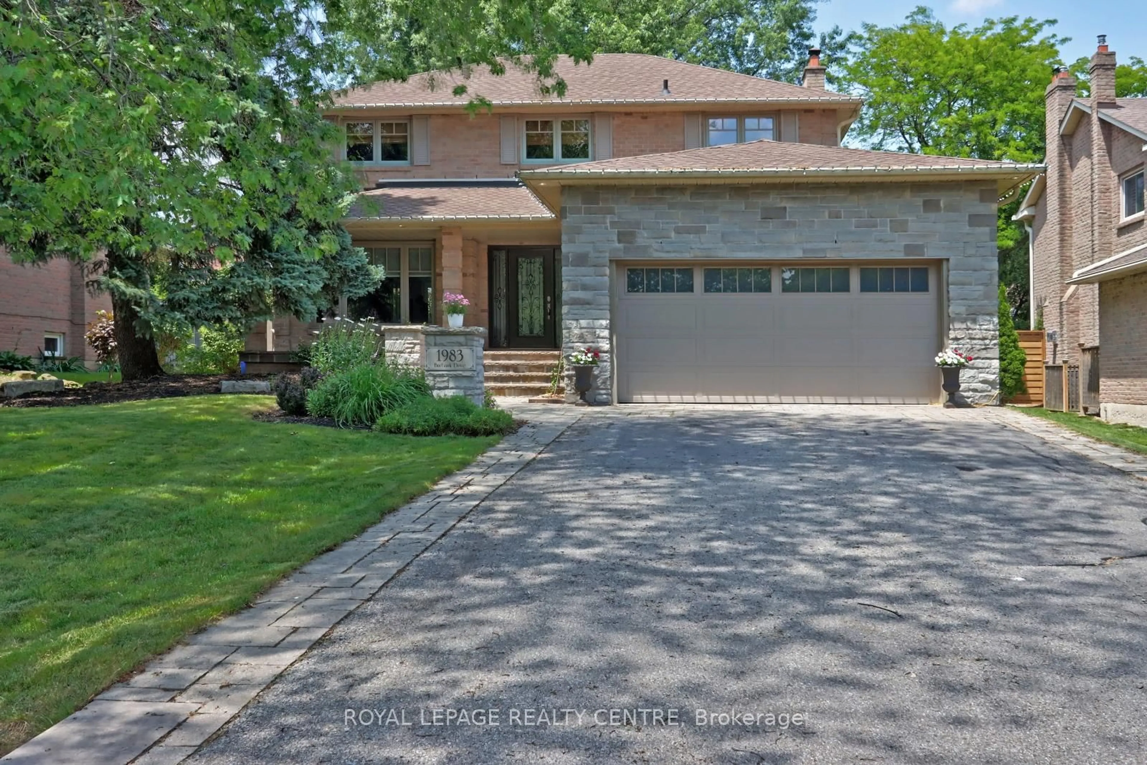 Home with brick exterior material, street for 1983 Burbank Dr, Mississauga Ontario L5L 2T6