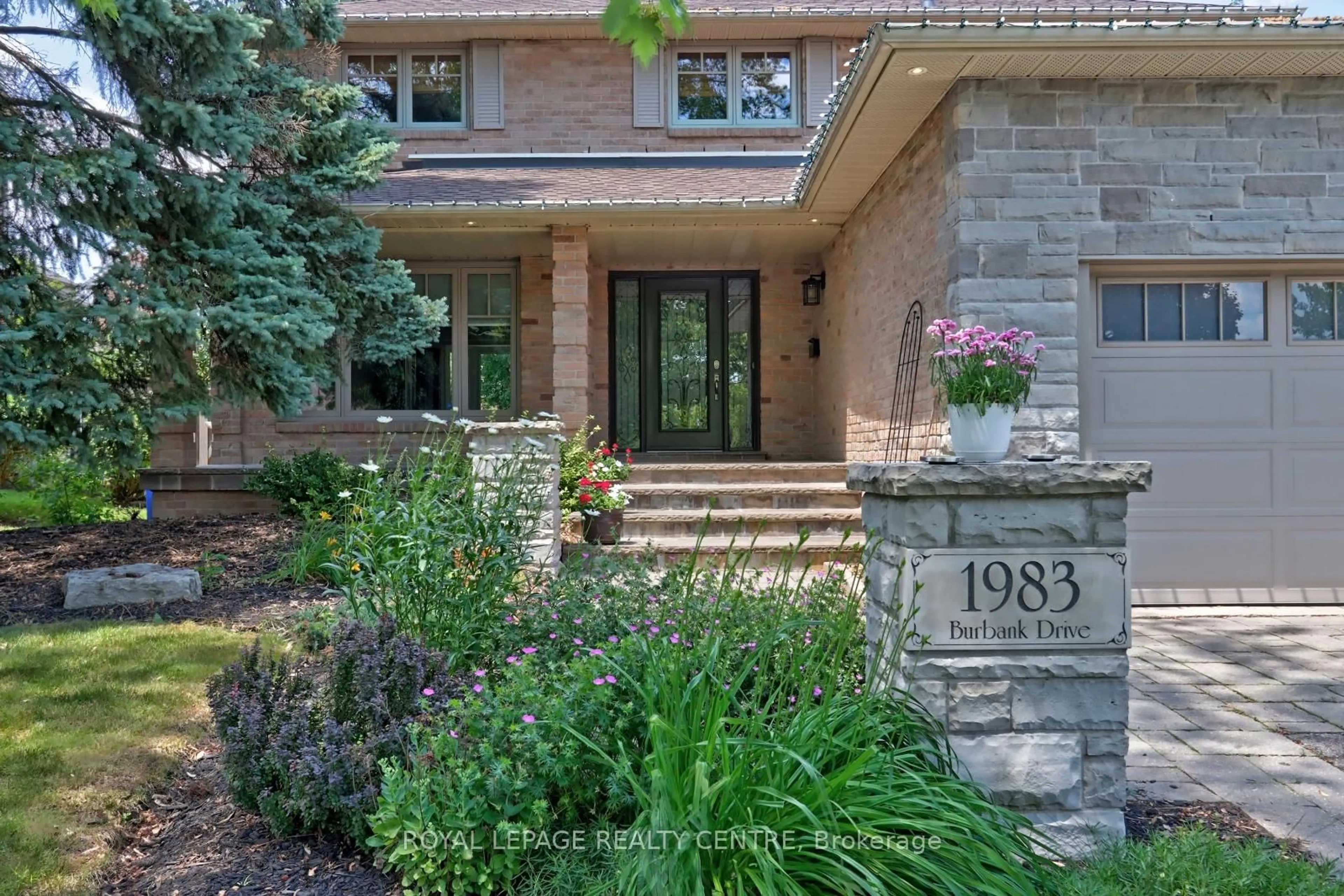 Home with brick exterior material, street for 1983 Burbank Dr, Mississauga Ontario L5L 2T6