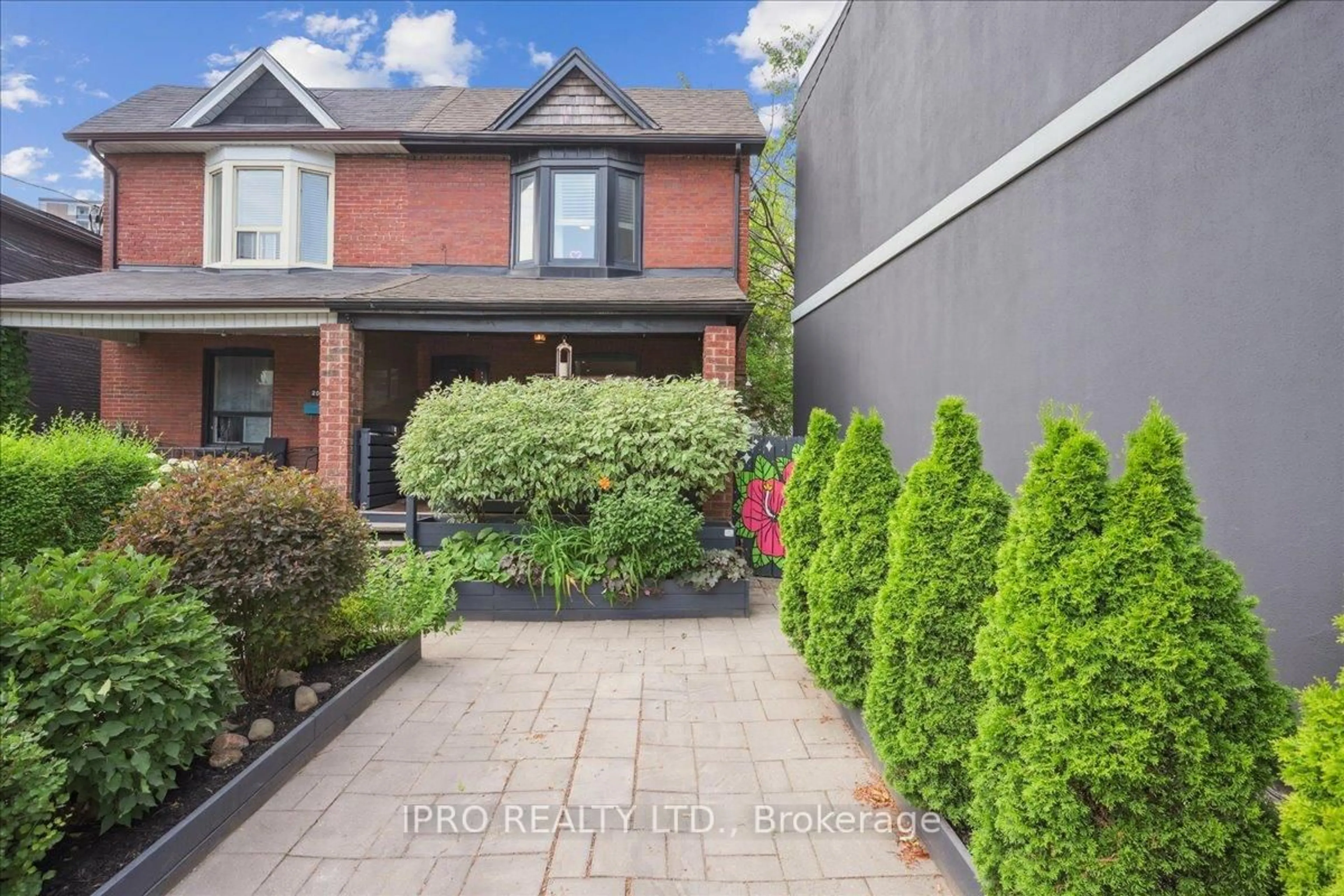 Home with brick exterior material, street for 2043 Davenport Rd, Toronto Ontario M6N 1C5